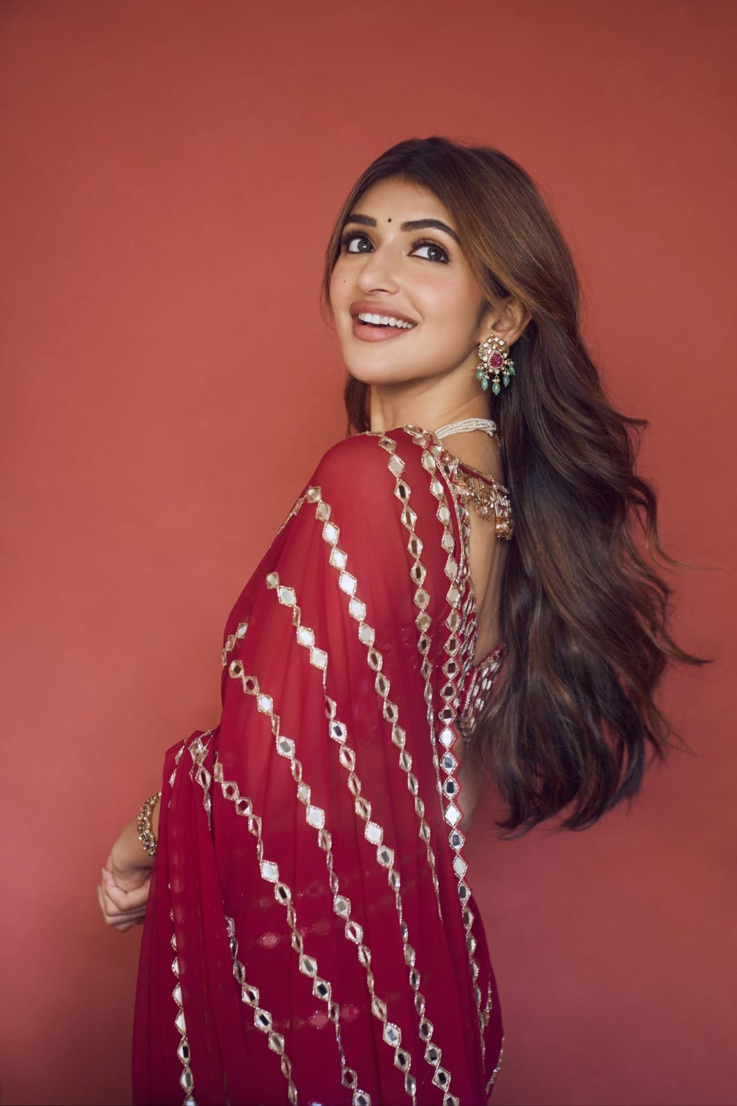 SREELEELA IN Ruby red Linear Mirror Saree Set
