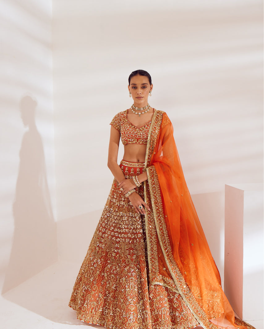 Burnt Orange Net Silk Sequin Zari Embroidered Lehenga Set