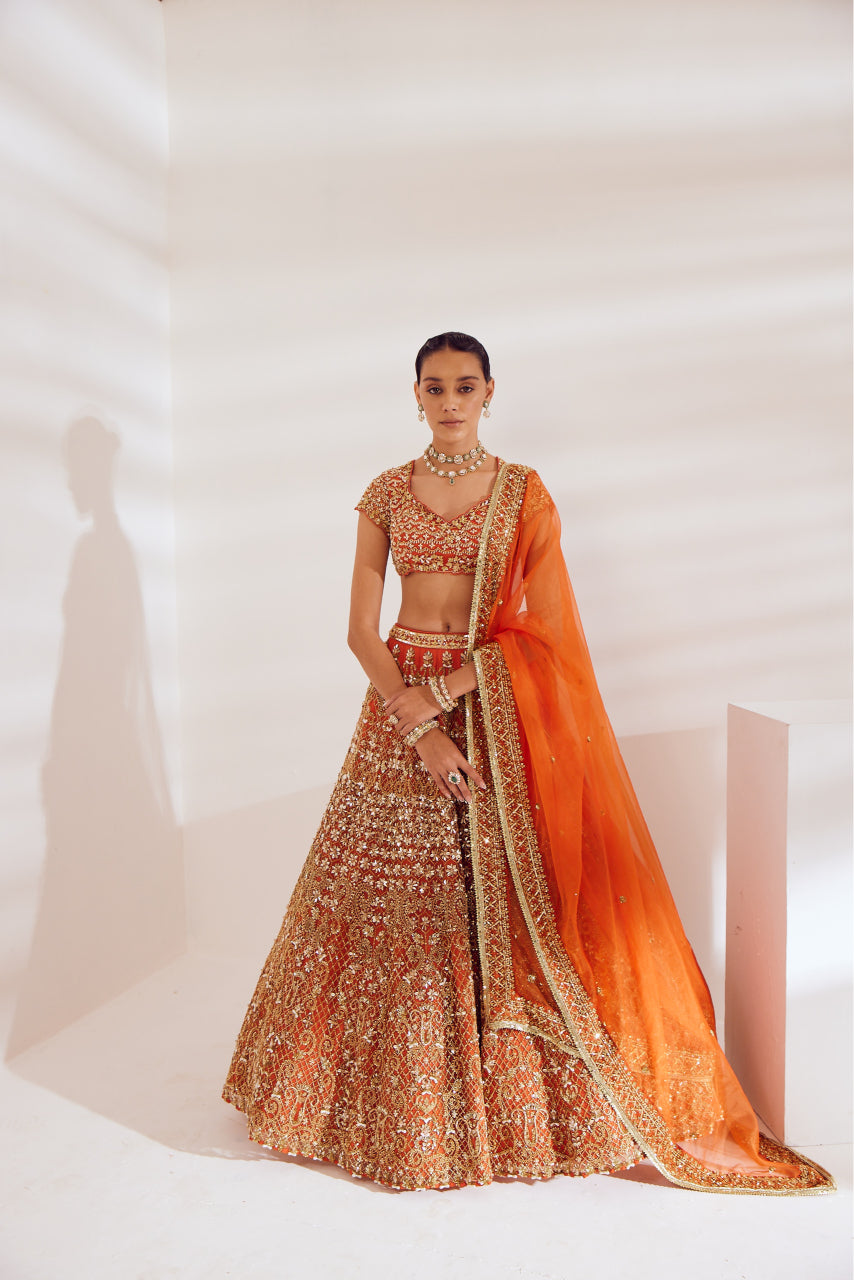 Burnt Orange Net Silk Sequin Zari Embroidered Lehenga Set