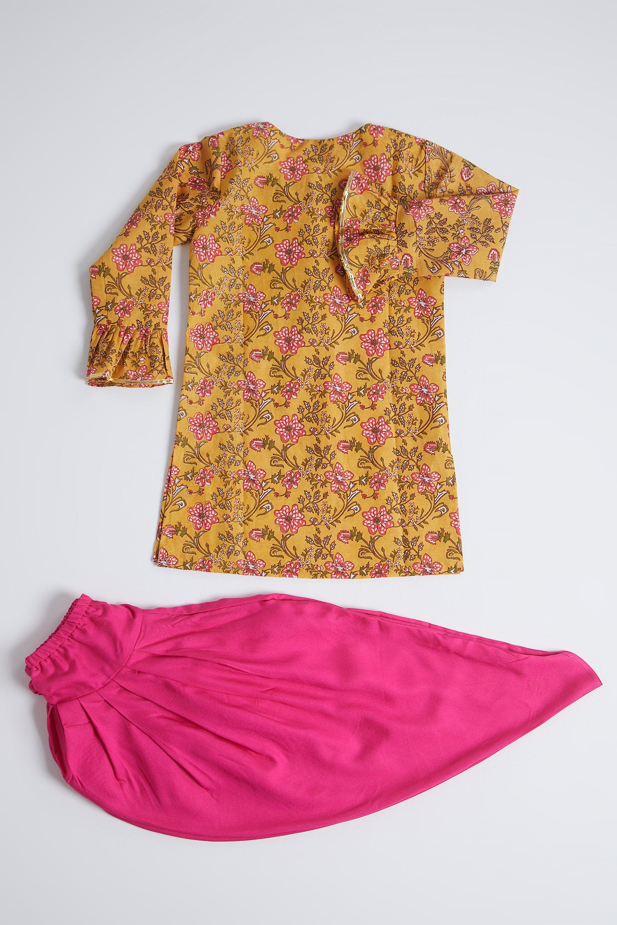 Turmeric Yellow & Pink Printed Dhoti Set For Girls by Pankhuri by Priyanka - Kids at Pernia's Pop Up Shop