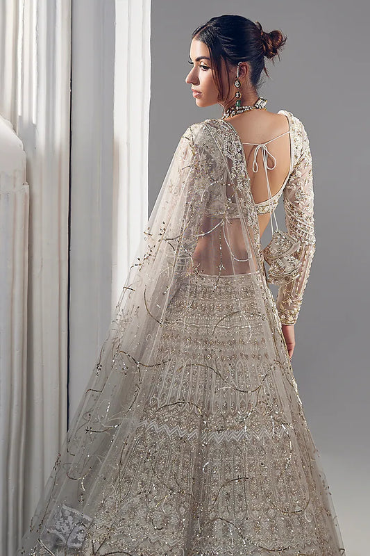 Ivory net thread embroidered lehenga set