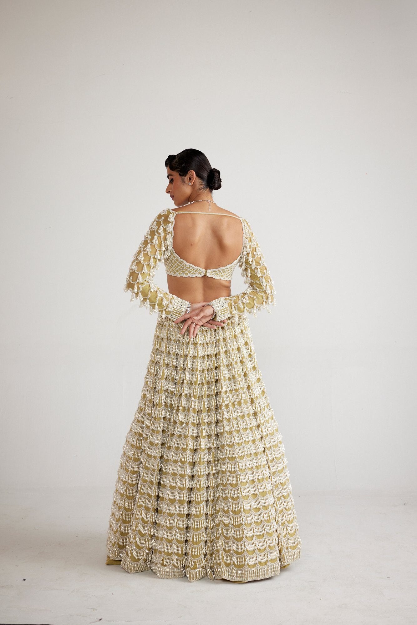 Fern Green Chandelier Pearl Drop Heavy Lehenga set