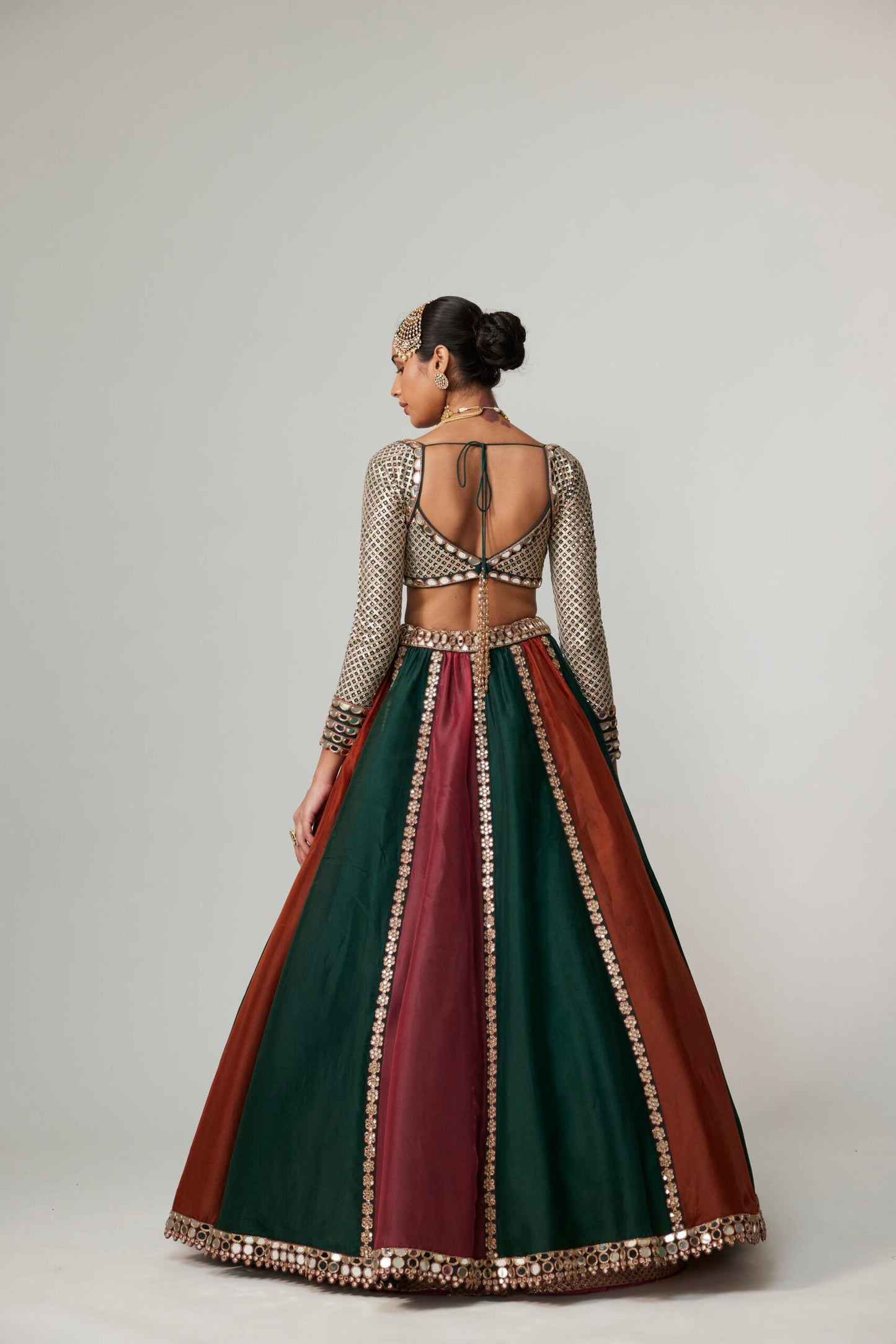 CRANBERRY MULTICOLOR LINEAR LEHENGA WITH SWEETHEART FULL SLEEVE BLOUSE.