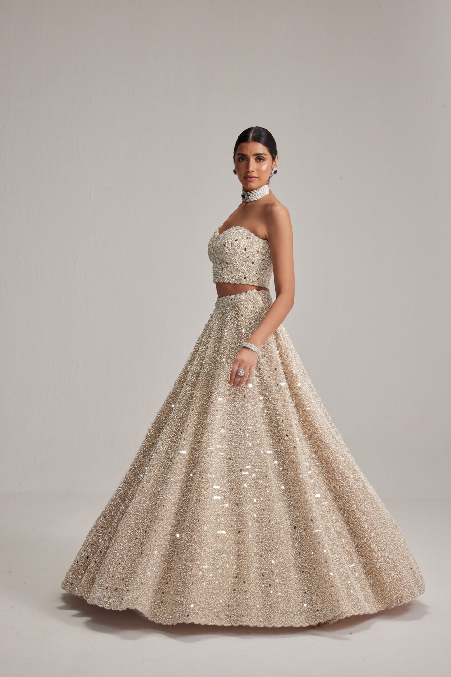 Light Beige Dense mirror and pearl Corset lehenga set