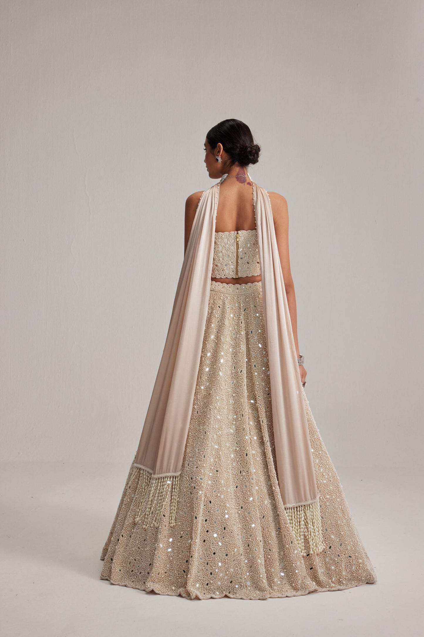 Light Beige Dense mirror and pearl Corset lehenga set With Stole