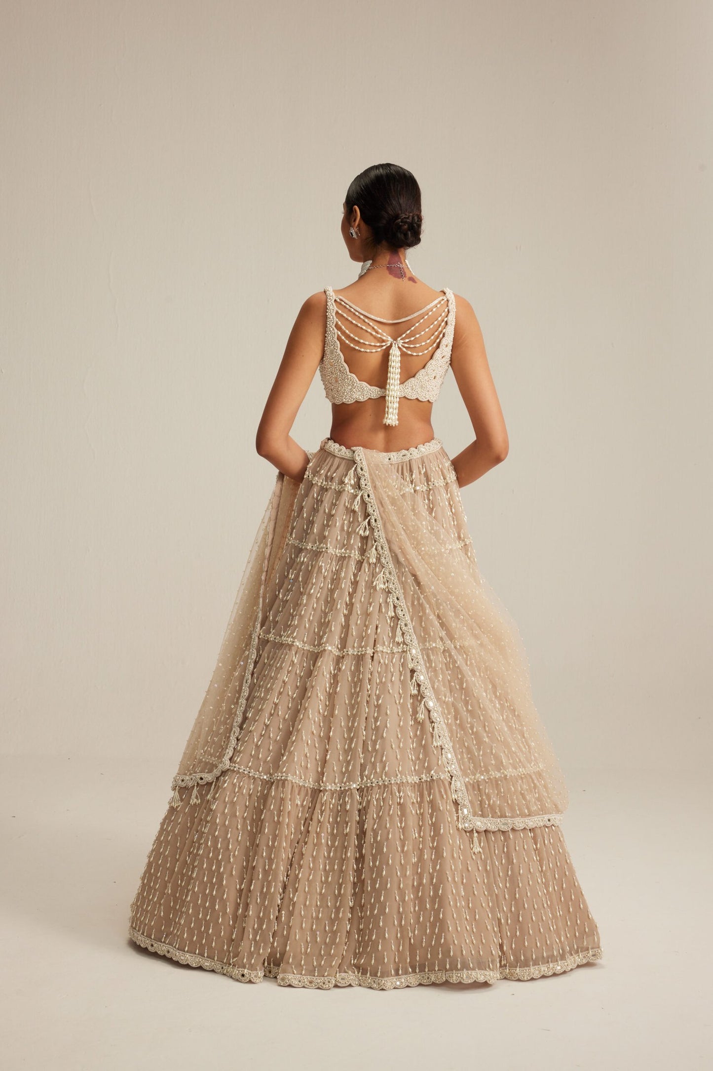 Light Beige Pearl Drop Multitier Lehenga with V neck Blouse