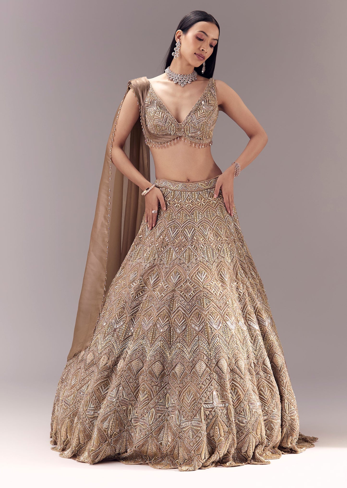 Gold Draped Blouse And Embellished Lehenga Set