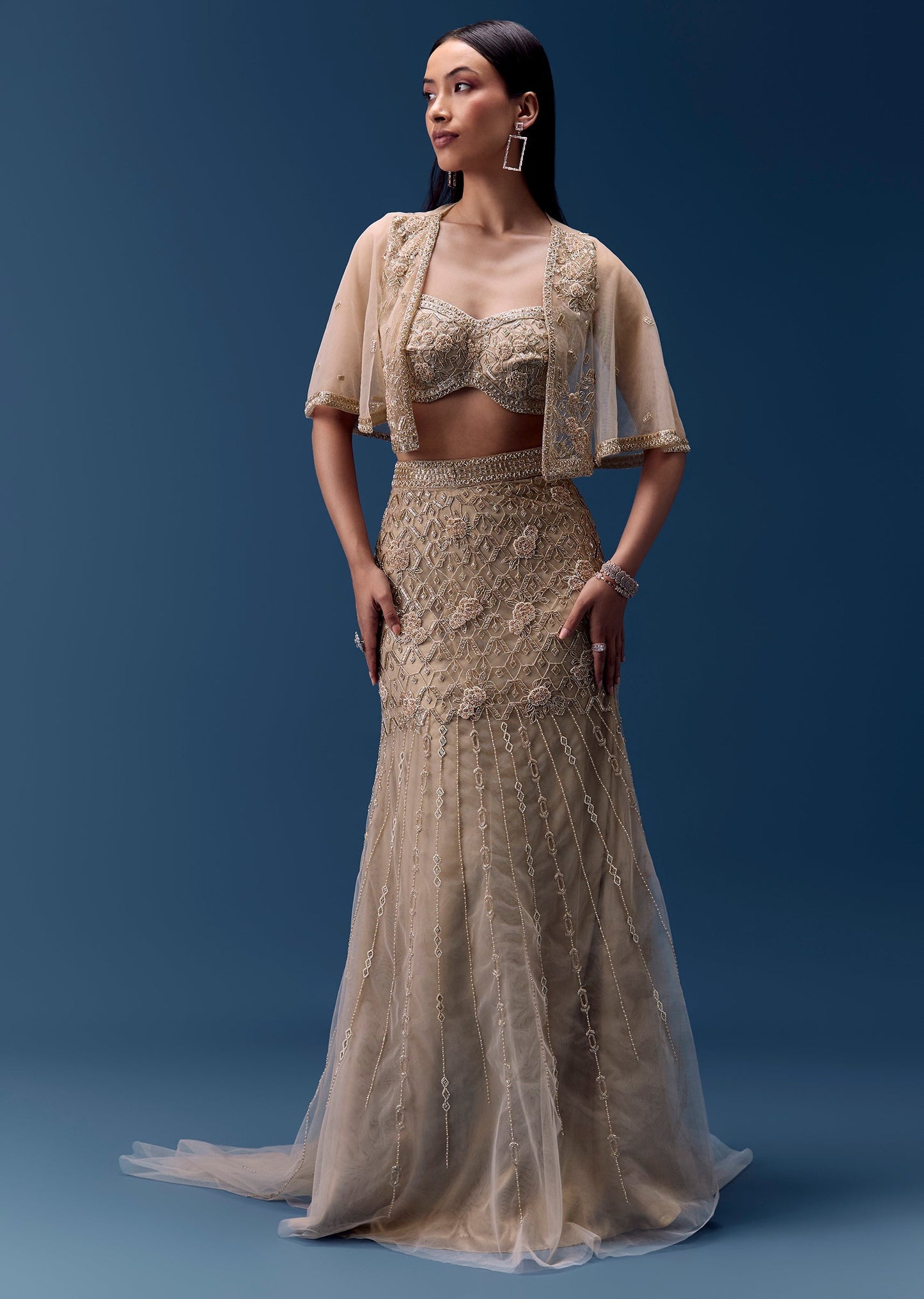 Ivory Embellished Fishcut Lehenga Set With Cape