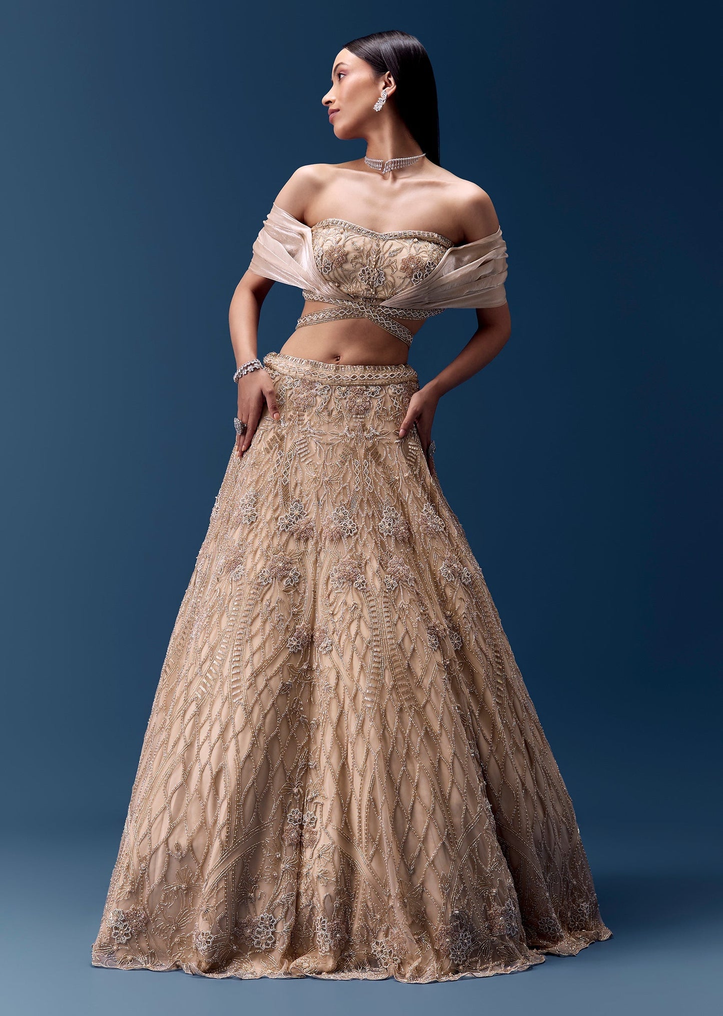 Ivory Off Shoulder Draped Blouse With Embellished Lehenga