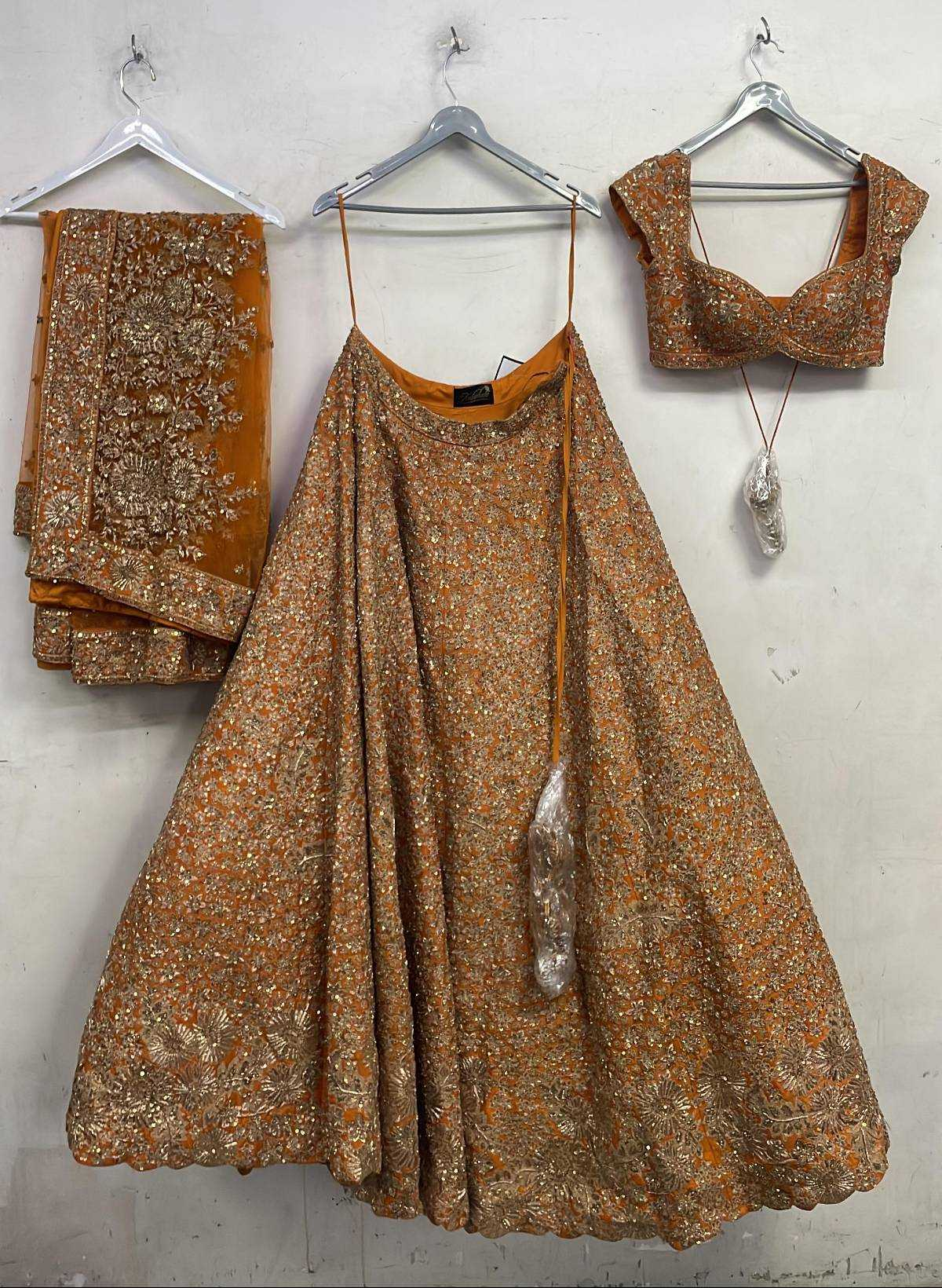 Rust Raw Silk Zari Hand & Machine Embroidered Lehenga Set
