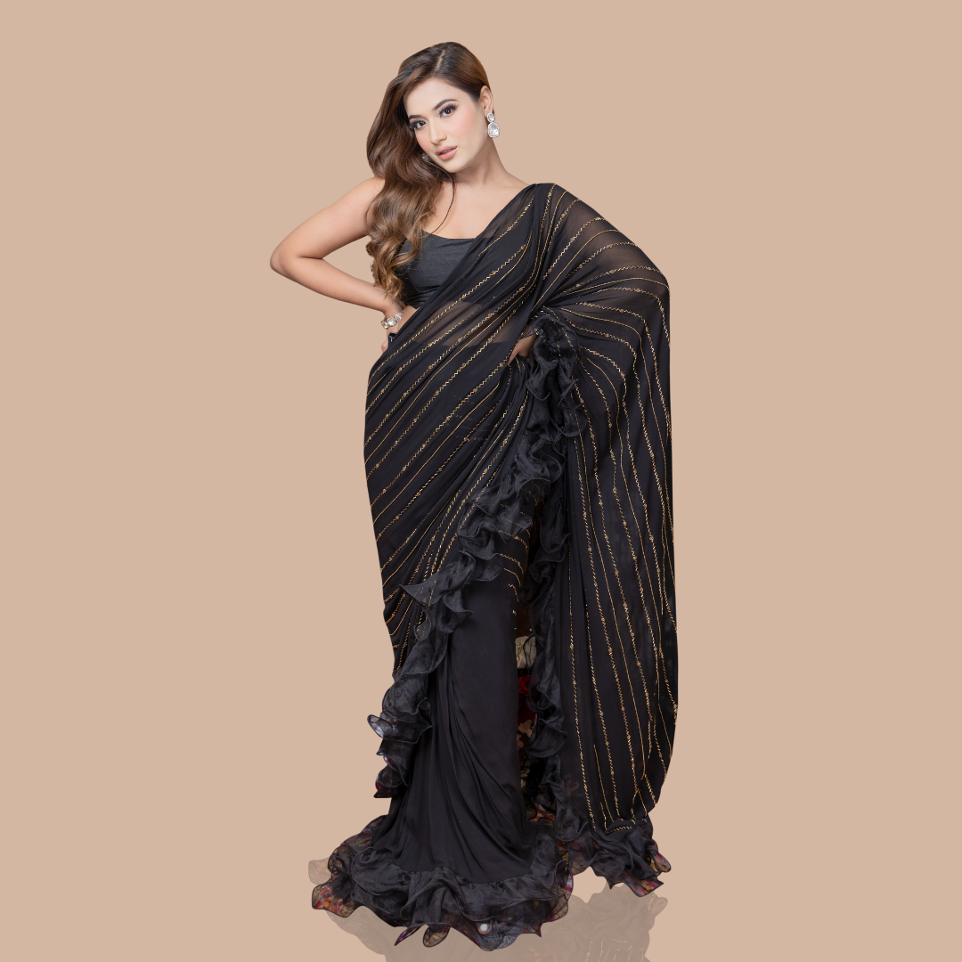 Black drape saree with ruffles and blouse
