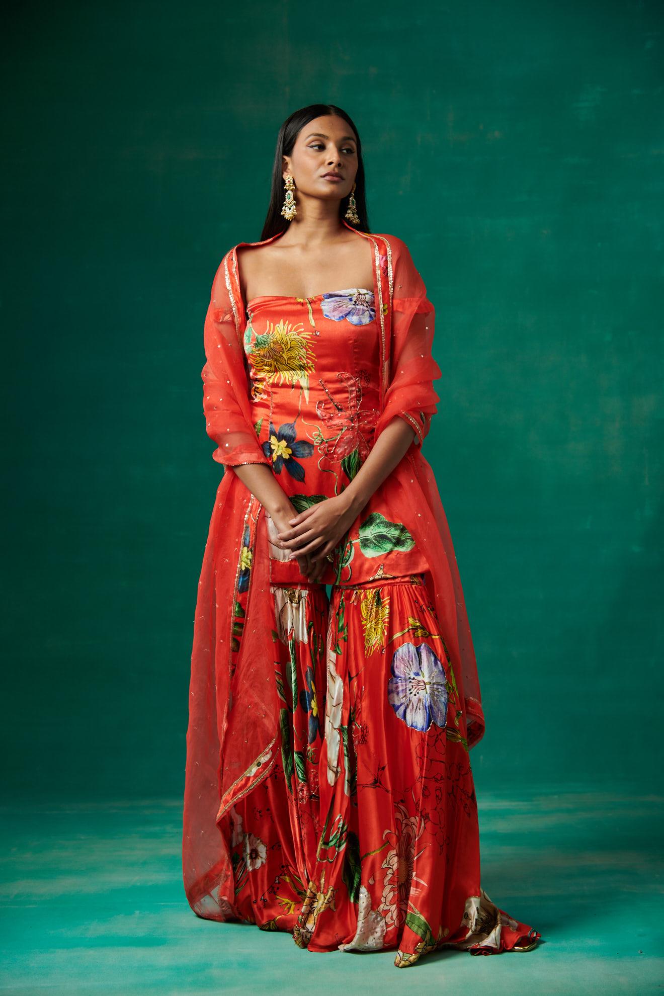 Orange printed kurta with garara and dupatta