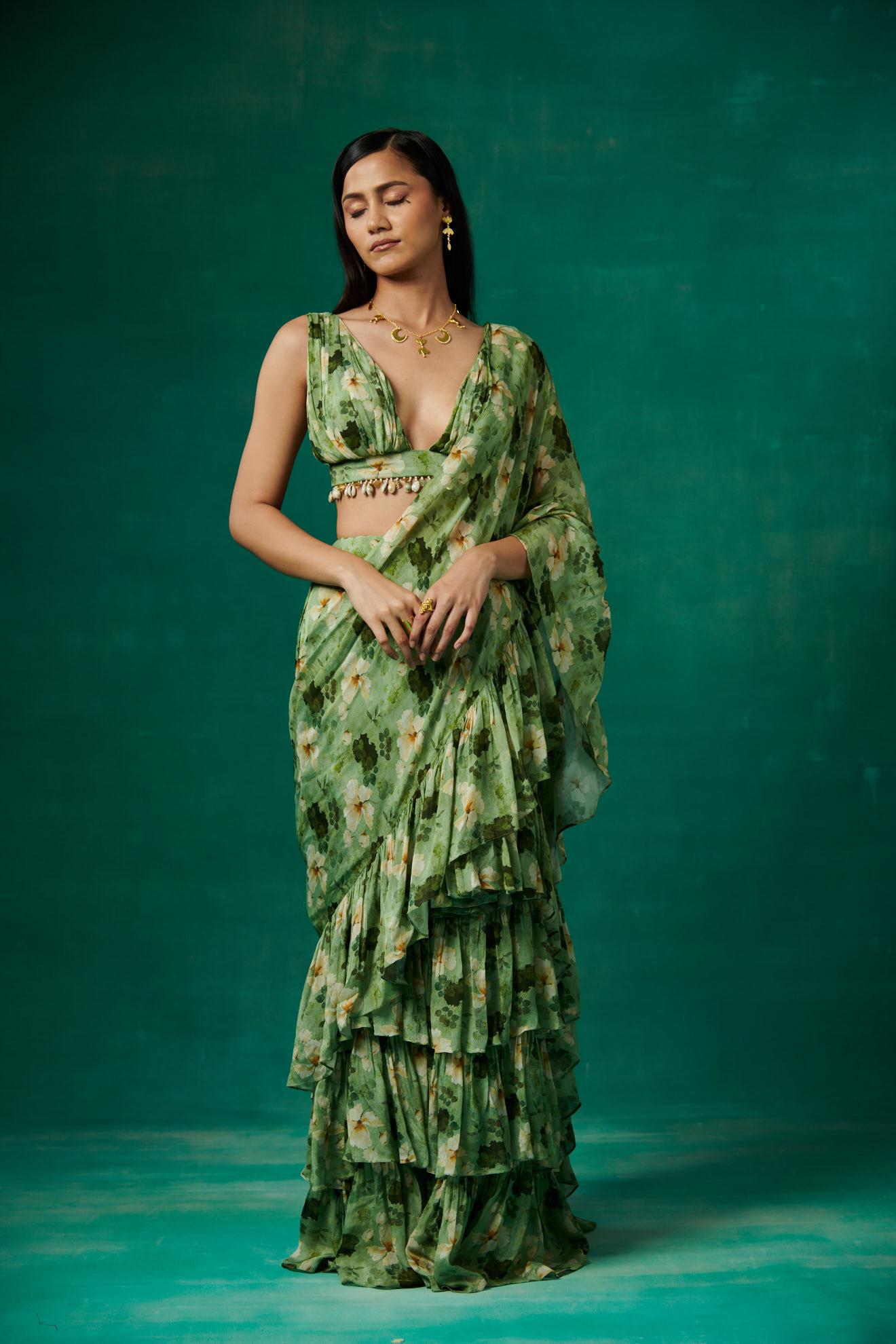 Green floral print drape saree with ruffles and plunge V neck blouse
