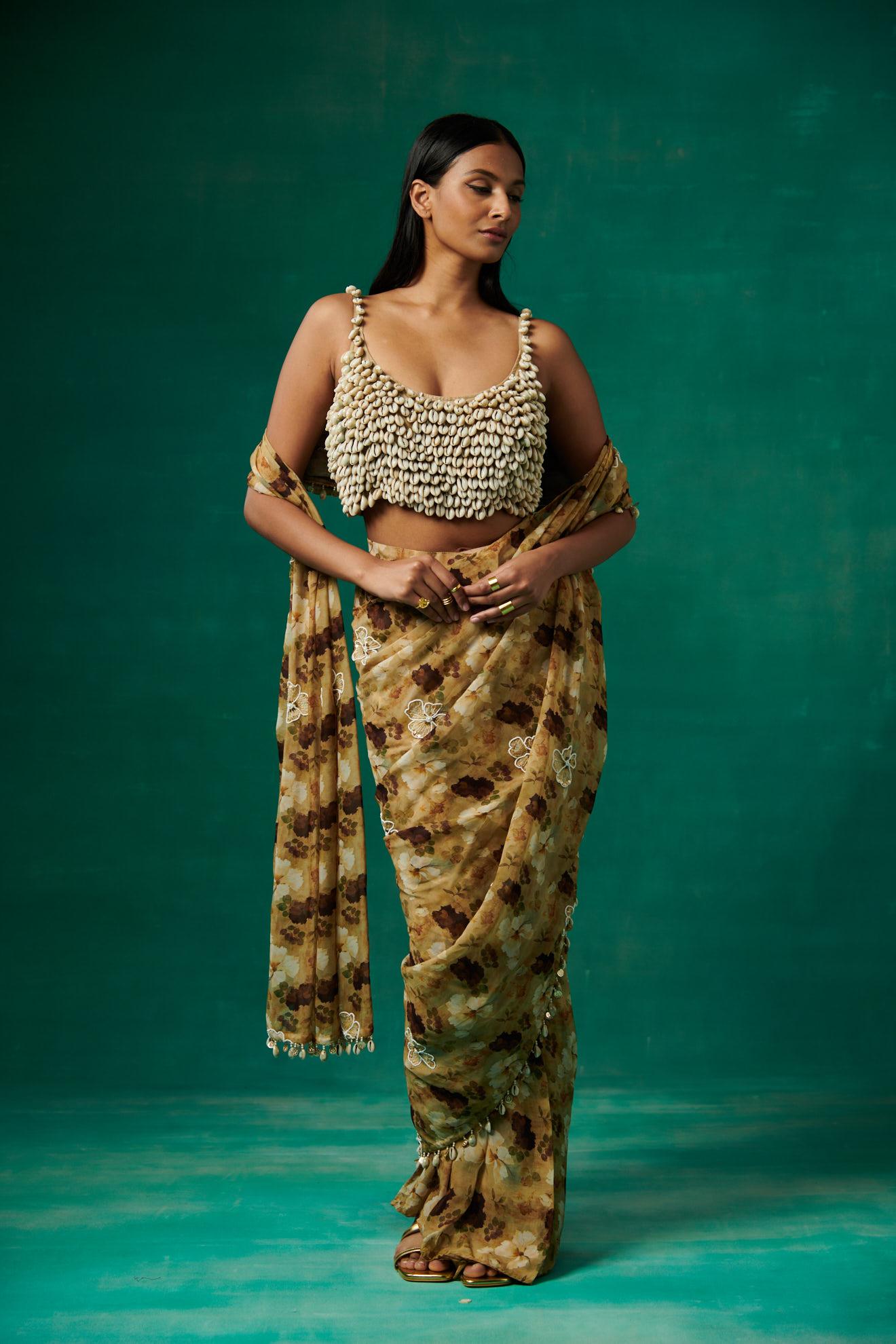 Shells embellished blouse and drape saree