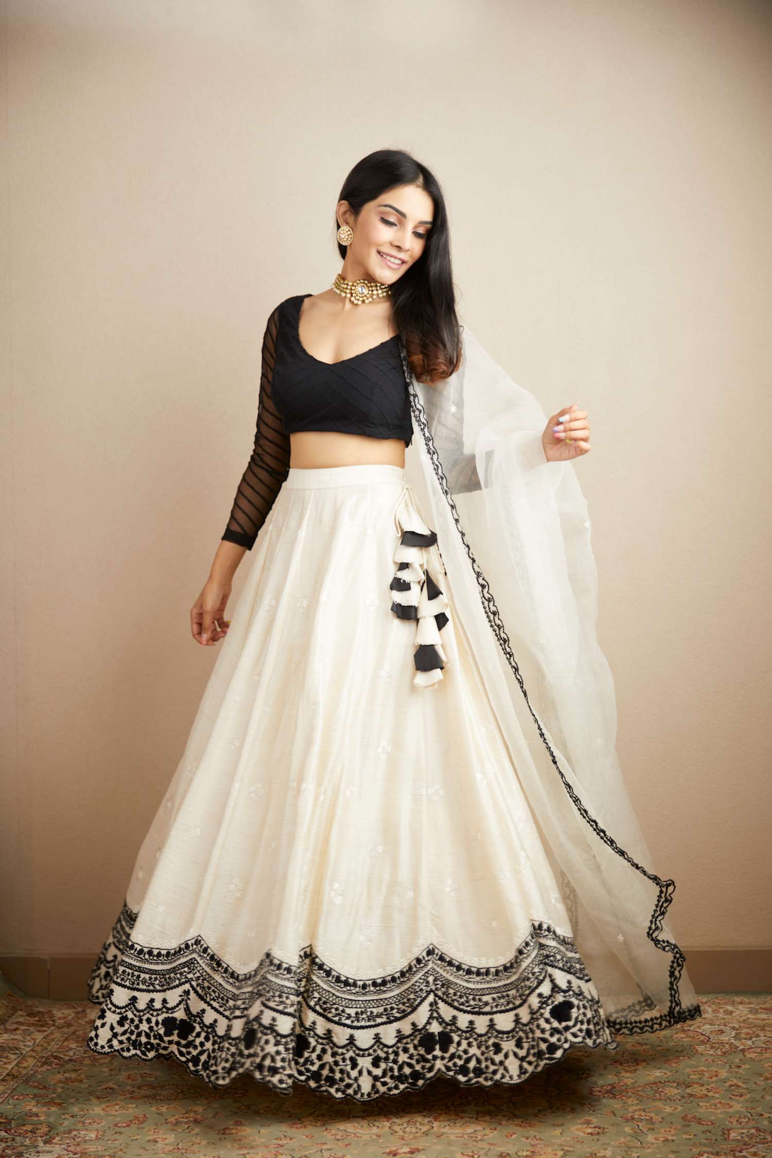 Front view of White Black Threadwork Lehenga Set