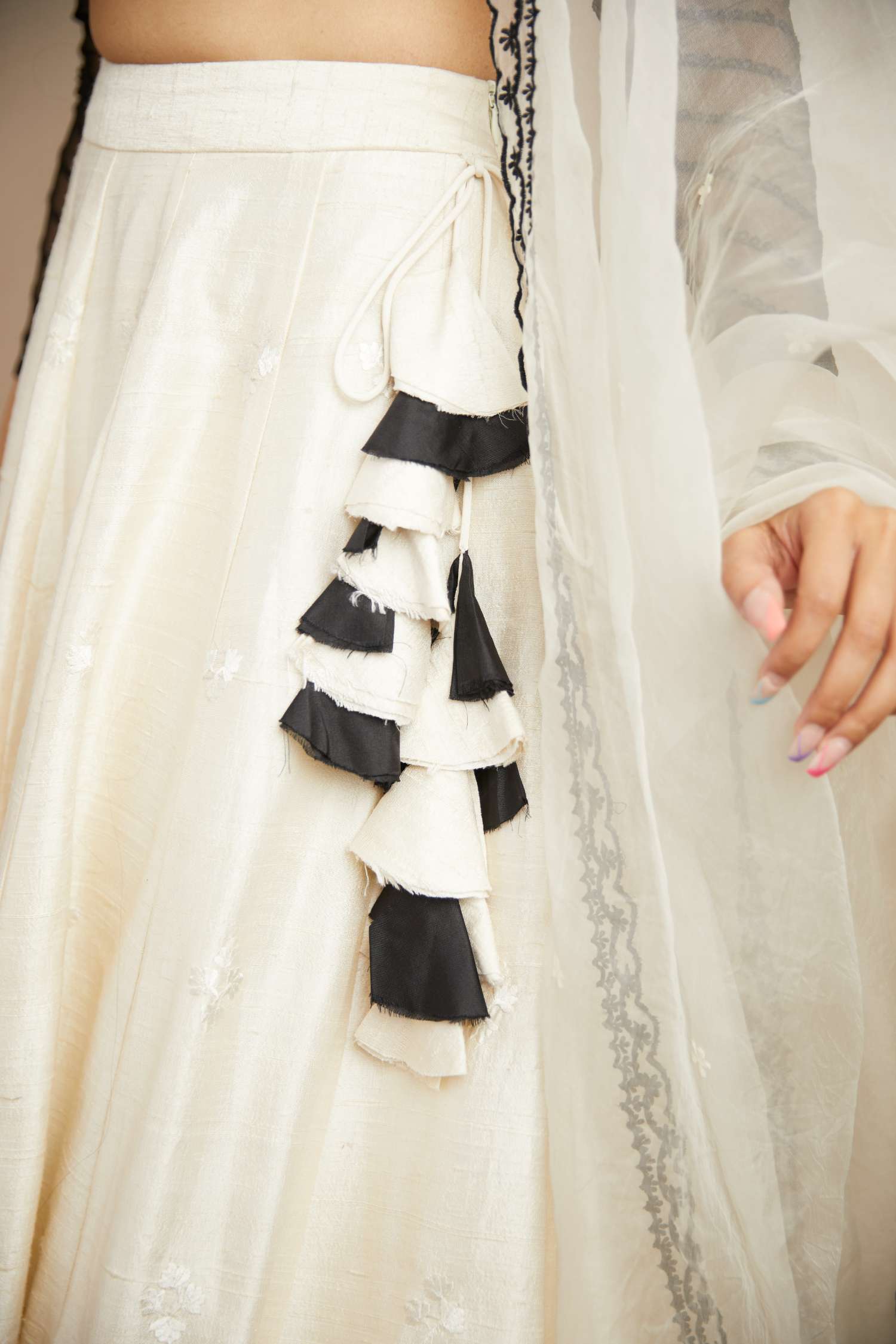 Close-up of White Black Threadwork Lehenga Set