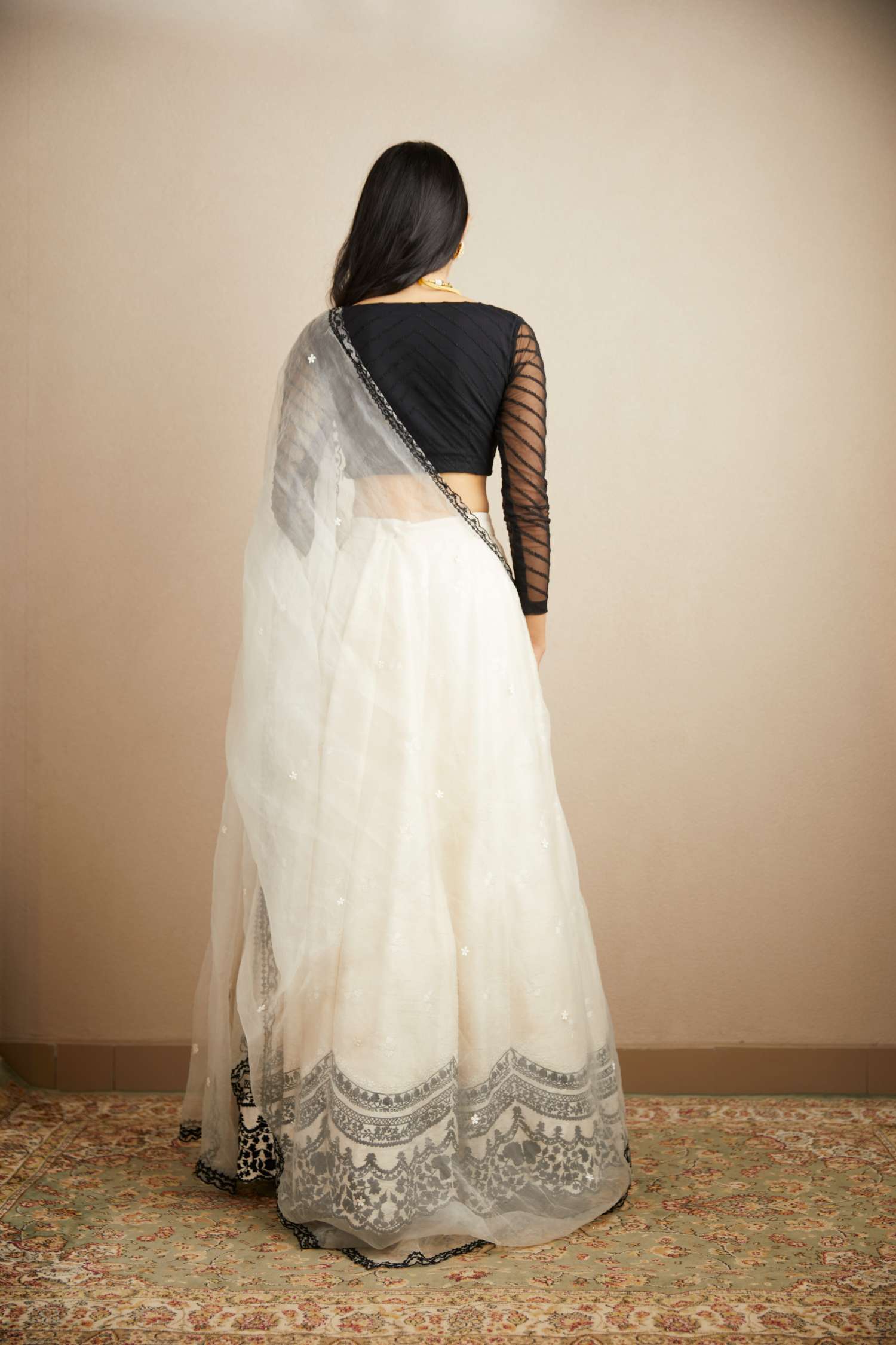 Back view of White Black Threadwork Lehenga Set