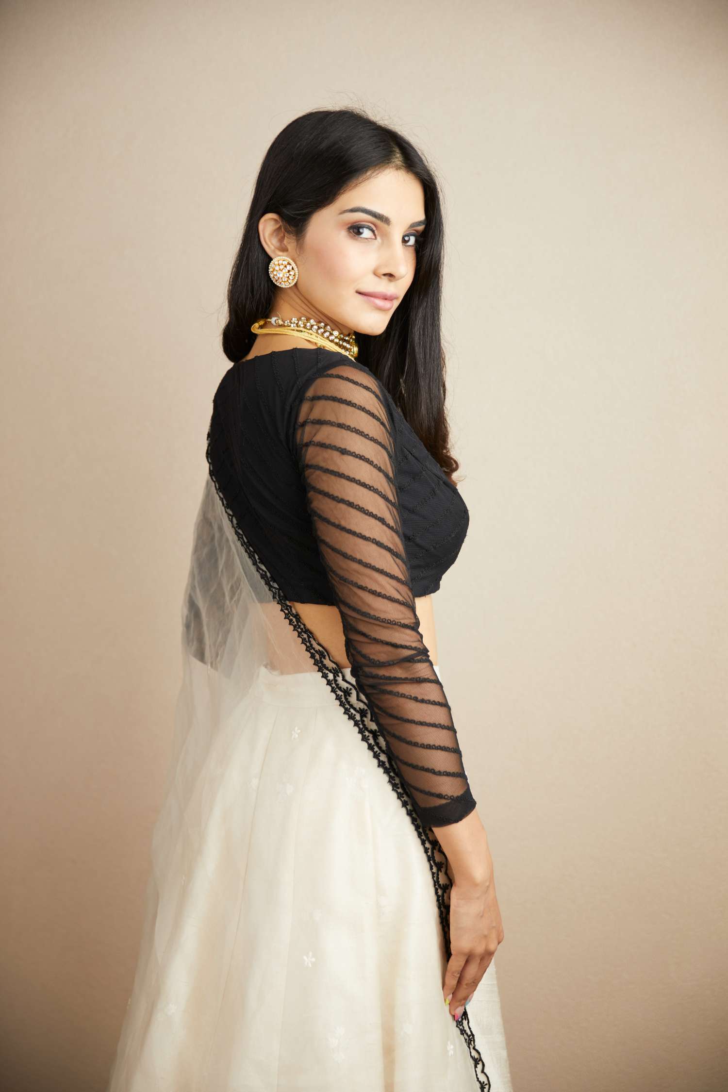 Side view of White Black Threadwork Lehenga Set