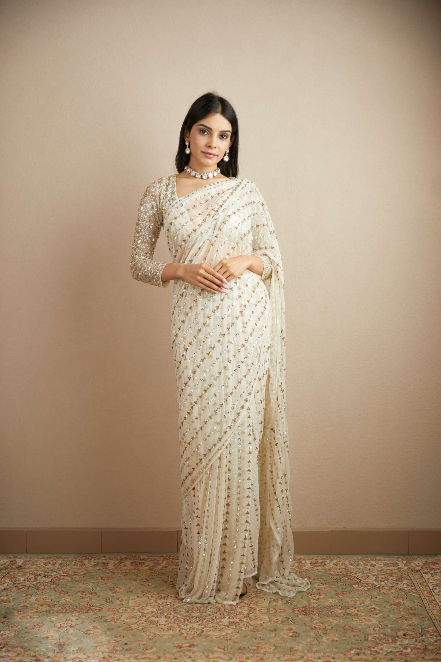 Front View of White Net Line Work Saree Set