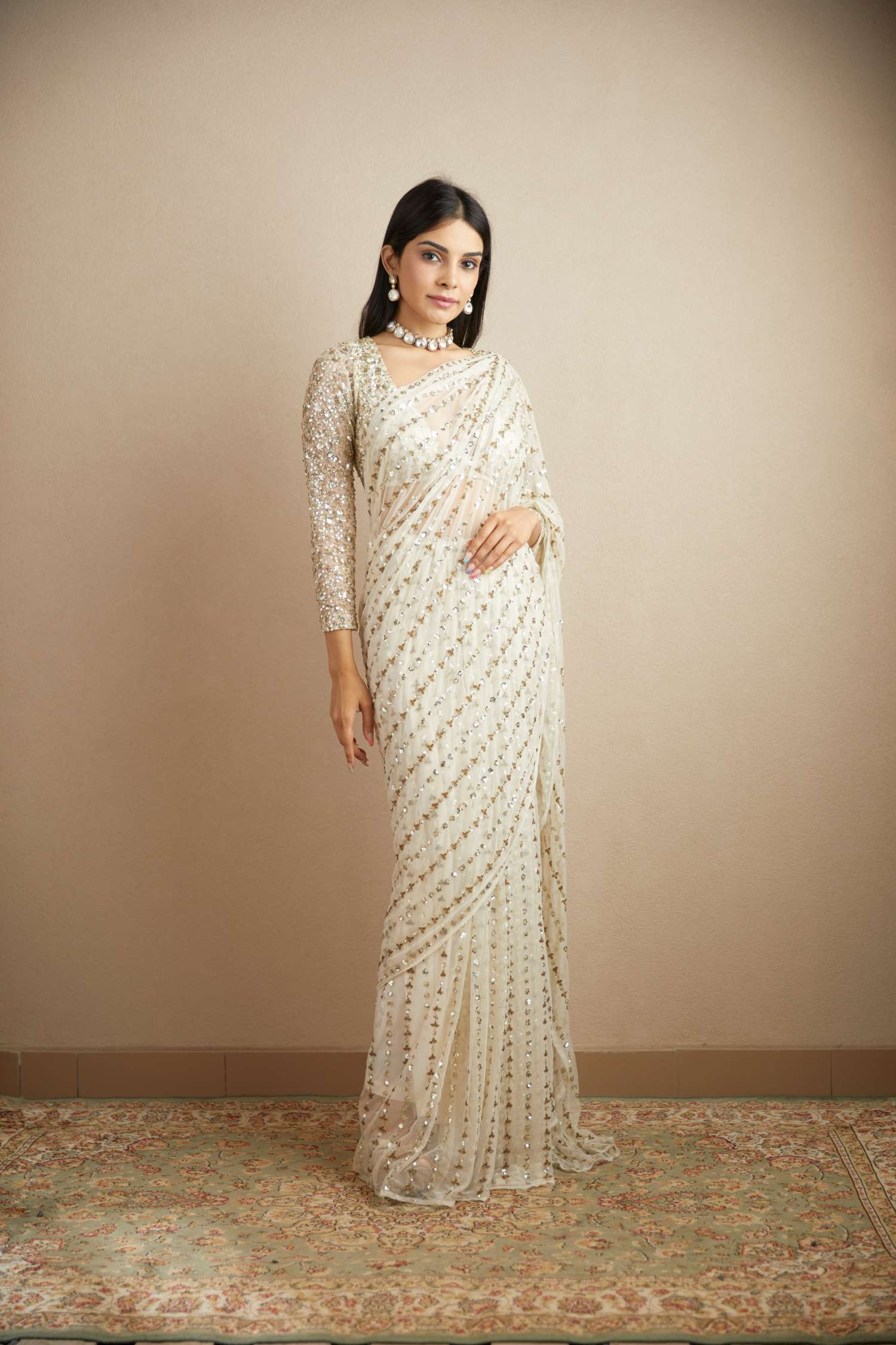Front view of White Net Line Work Saree Set