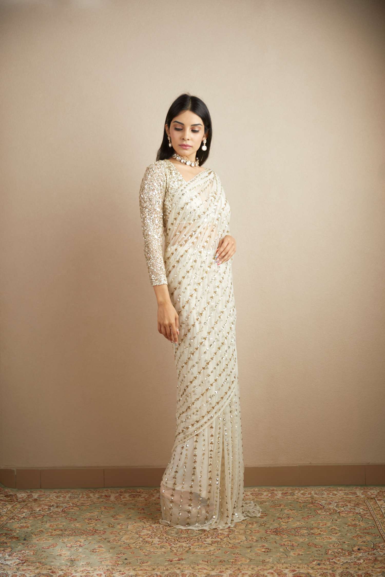 Side view of White Net Line Work Saree Set