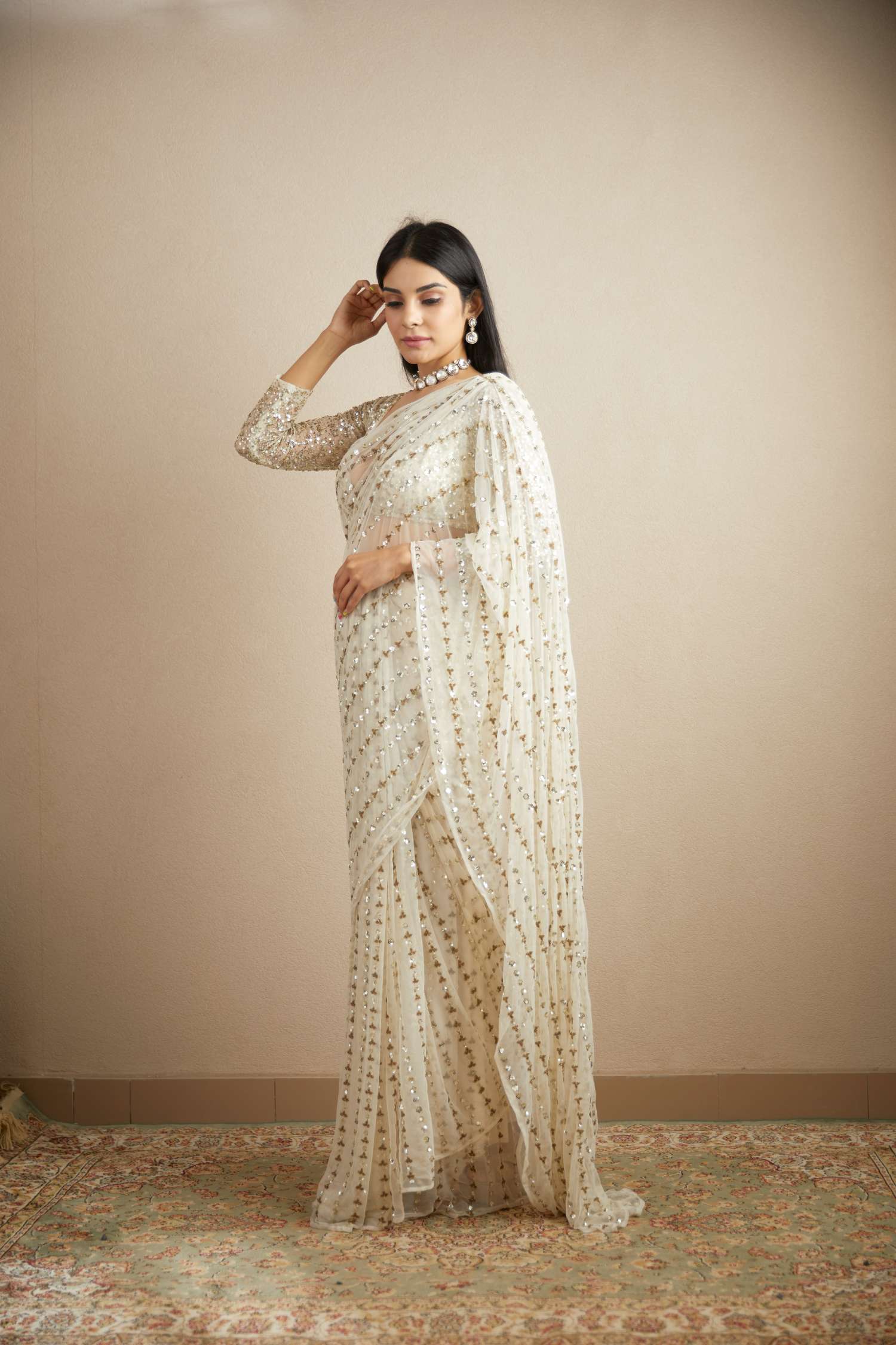 Front Side View of White Net Line Work Saree Set