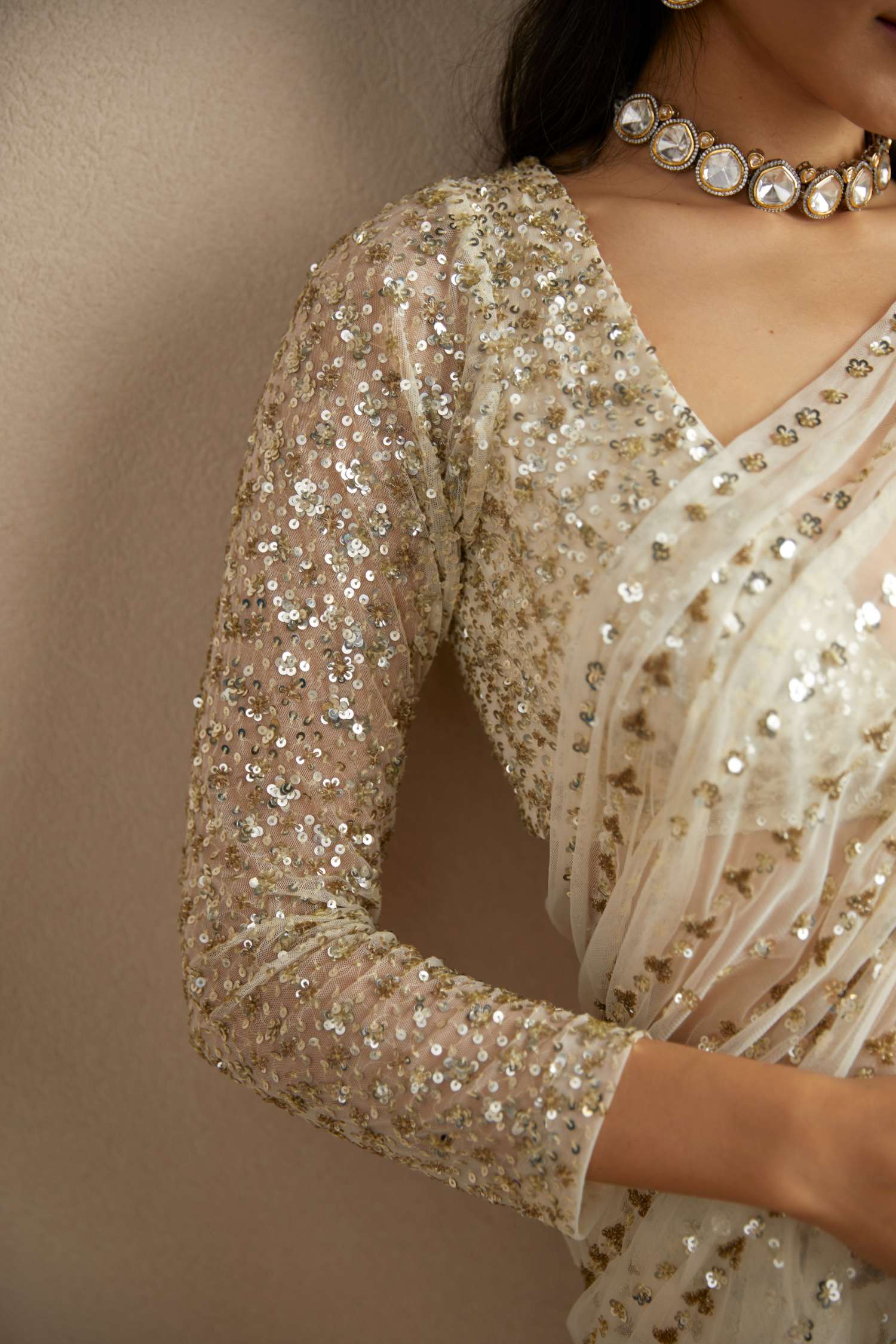 Close-up of White Net Line Work Saree