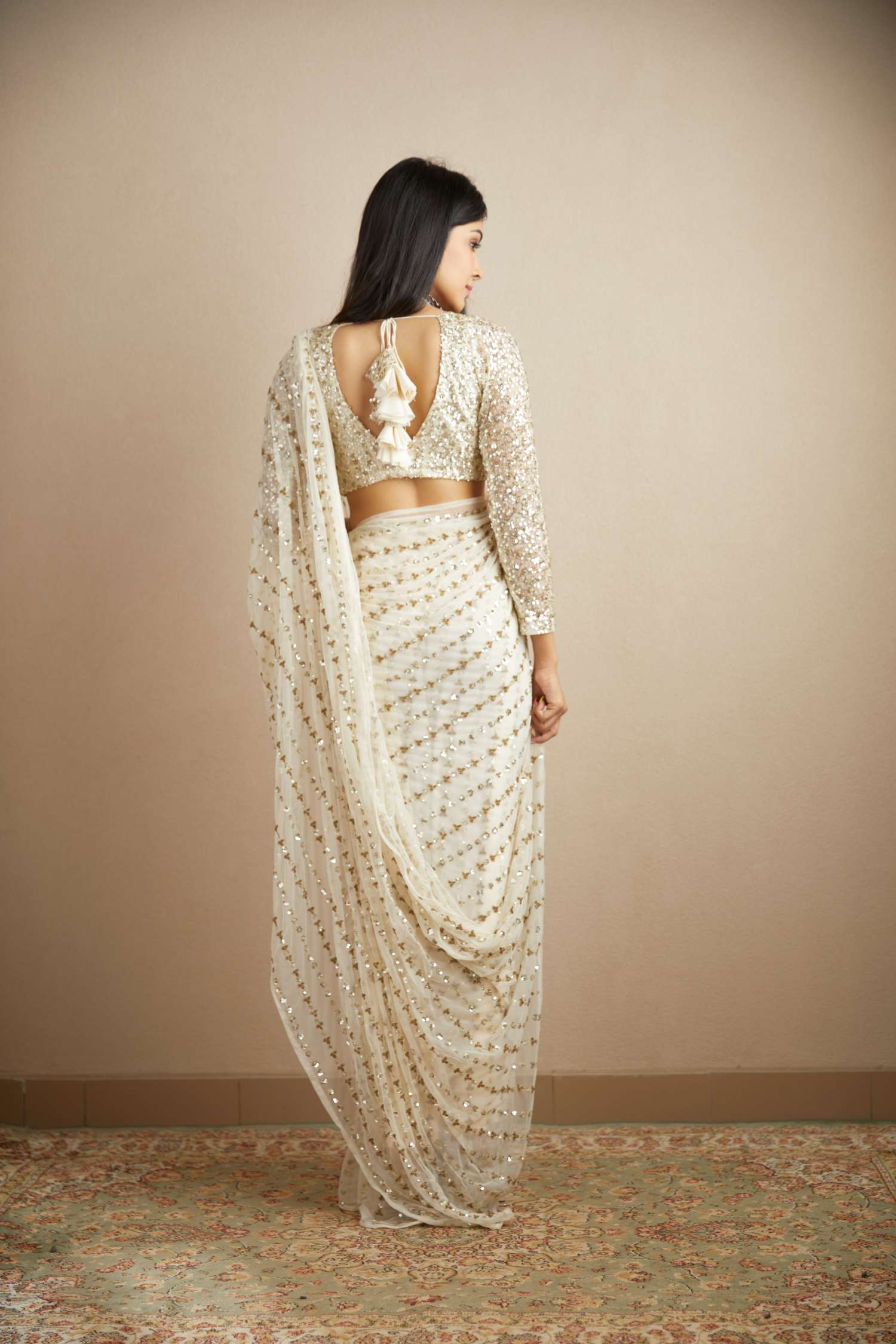 Back Angle view of White Net Line Work Saree Set
