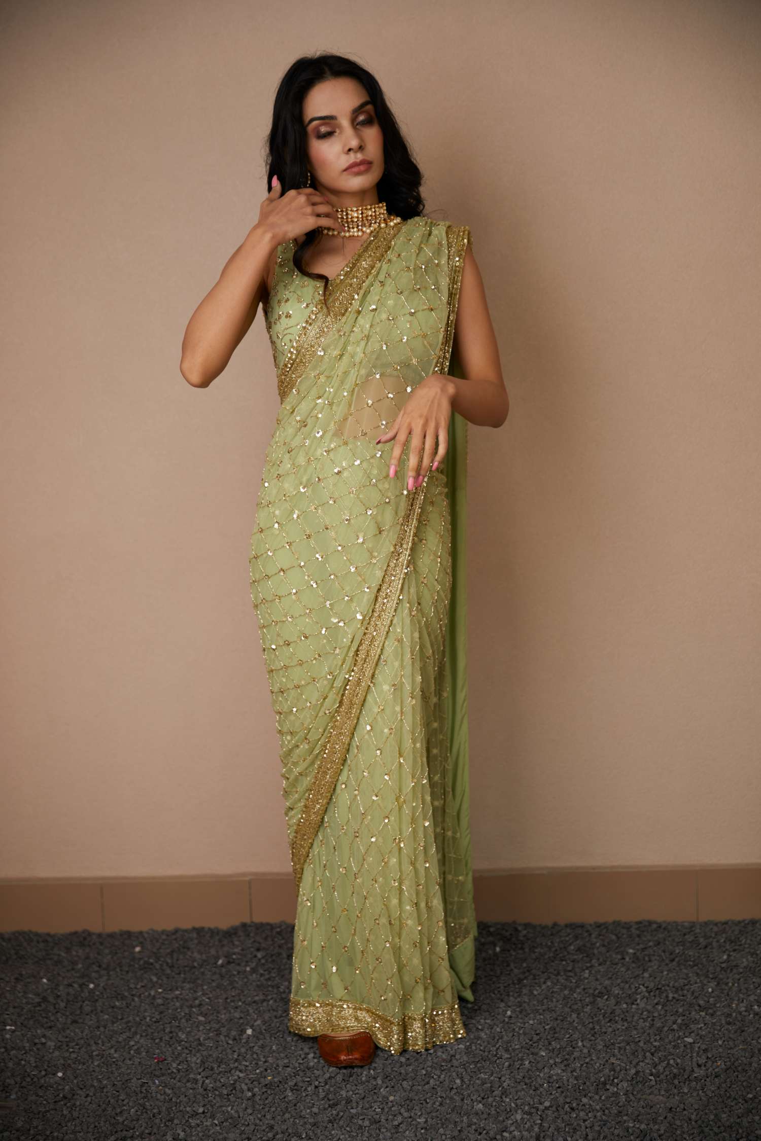 Front view of Mint Green Net Shimmer Saree Set