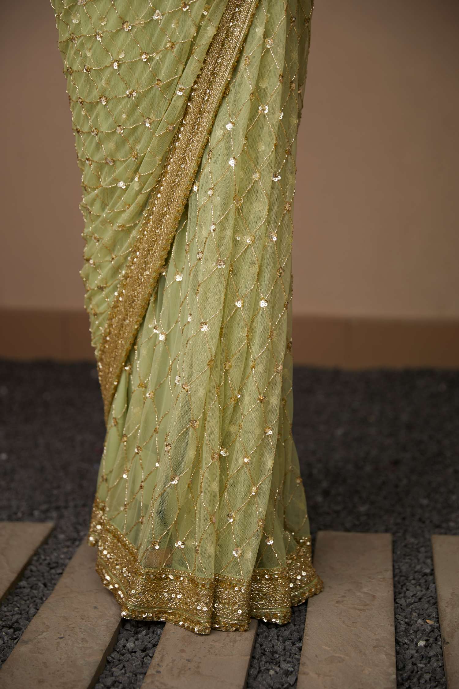 Close-up of Mint Green Net Shimmer Saree