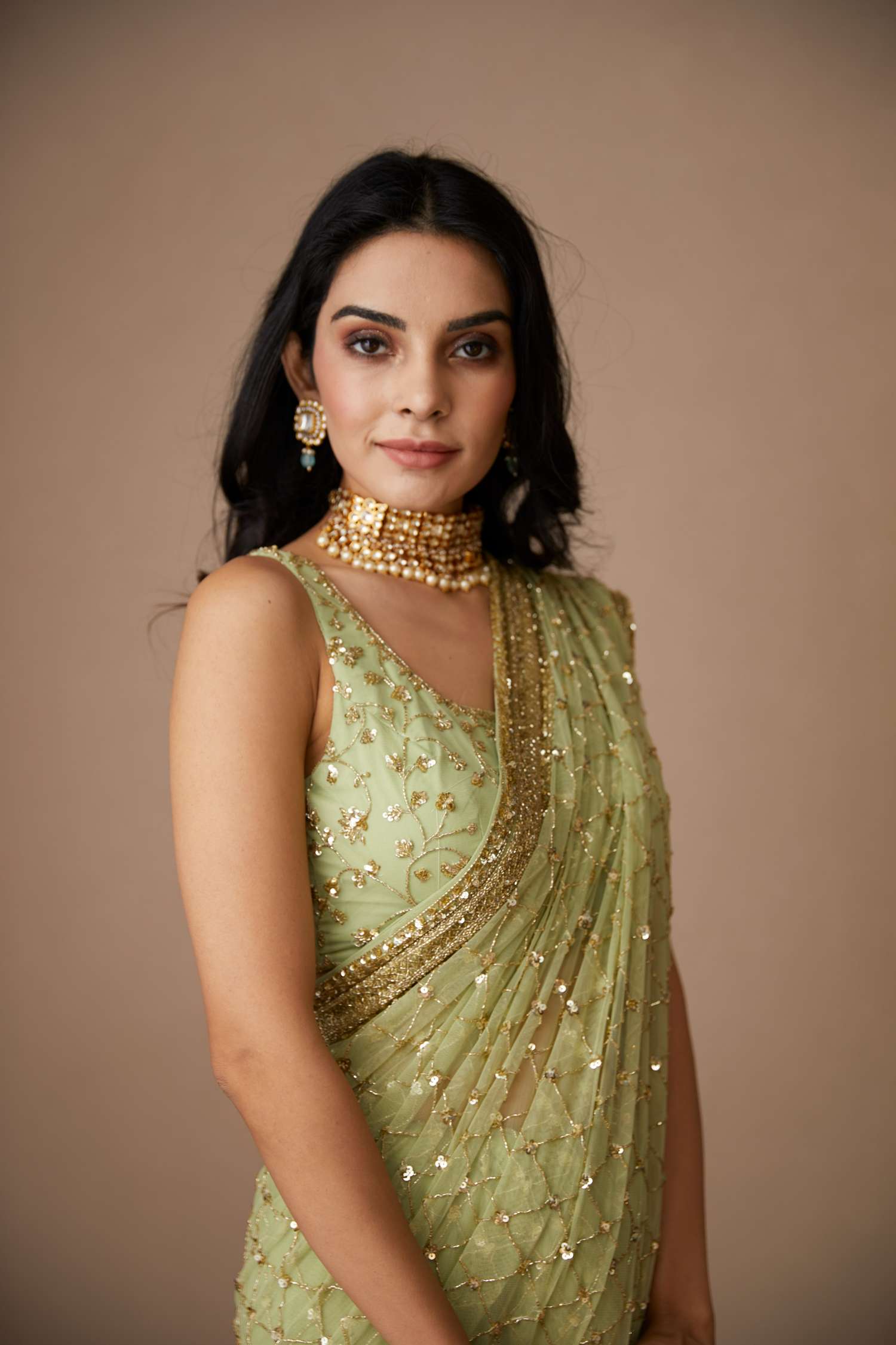 Front view of Mint Green Net Shimmer Saree Set