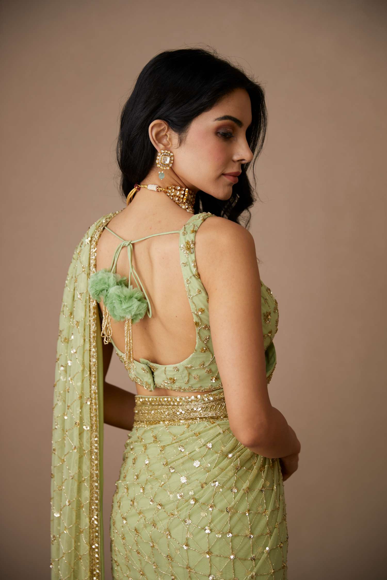 Back Angle view of Mint Green Net Shimmer Saree Set