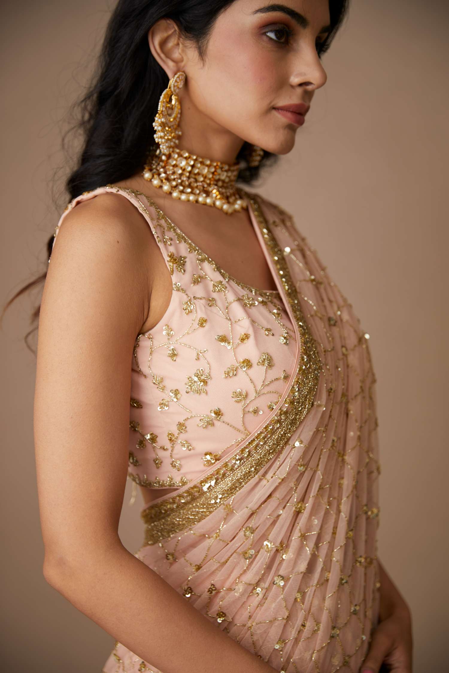 Close-up of Pink Net Jaal Cut Work Saree Set