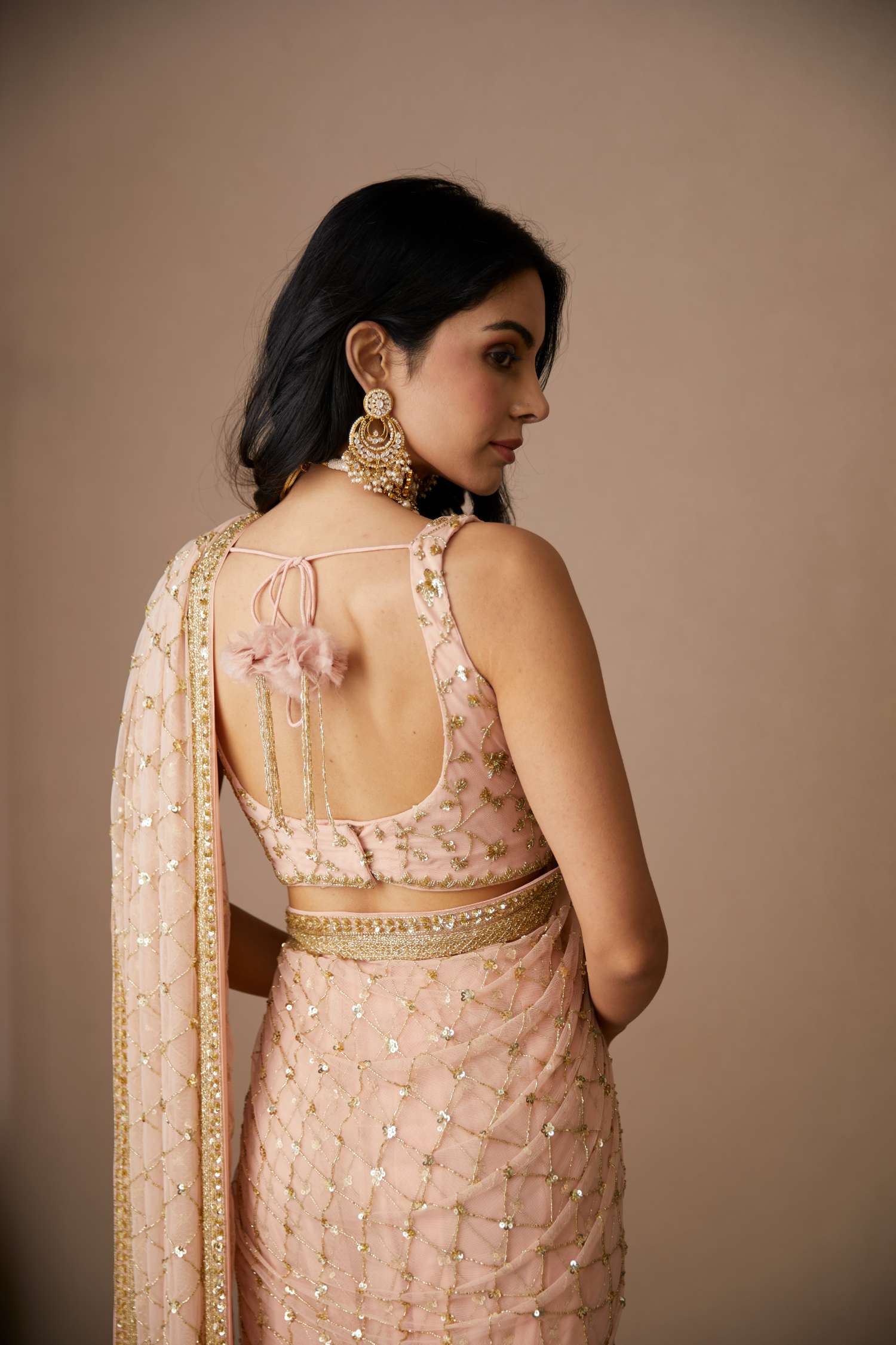 Back Angle view of Pink Net Jaal Cut Work Saree Set