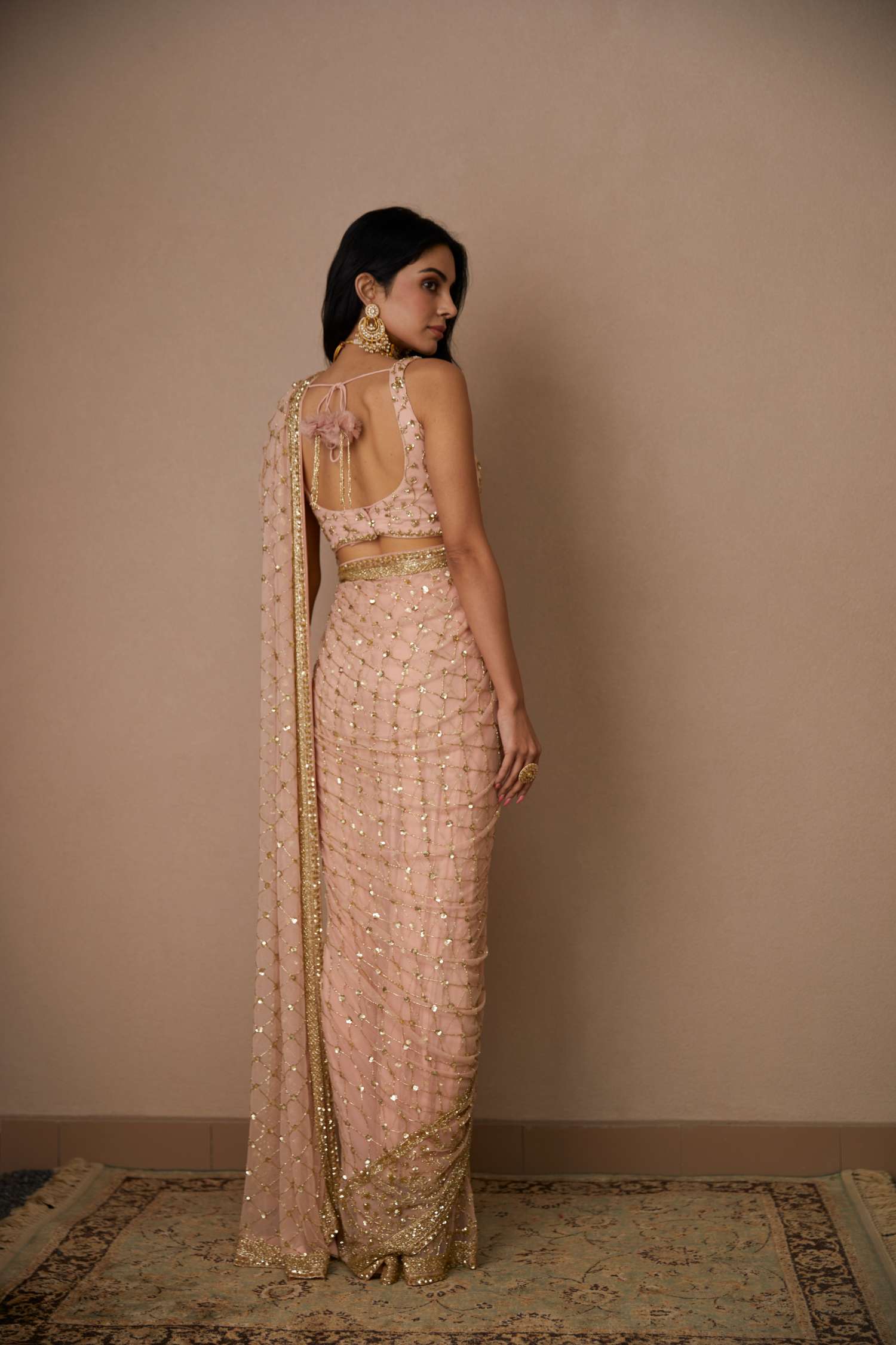 Back View of Pink Net Jaal Cut Work Saree Set