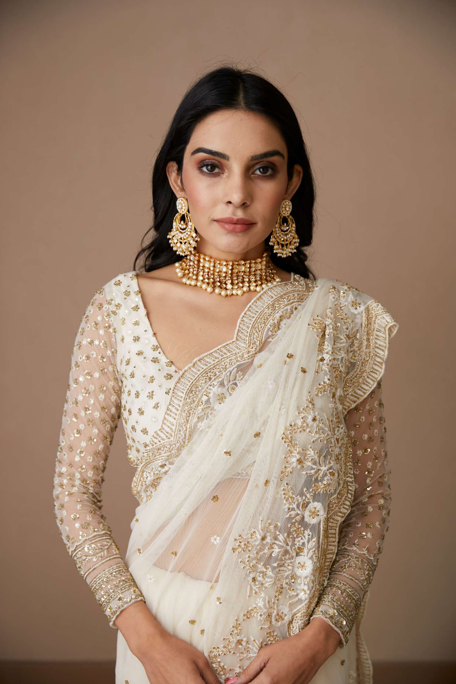 Close-up of White Net Thread Work Saree Set