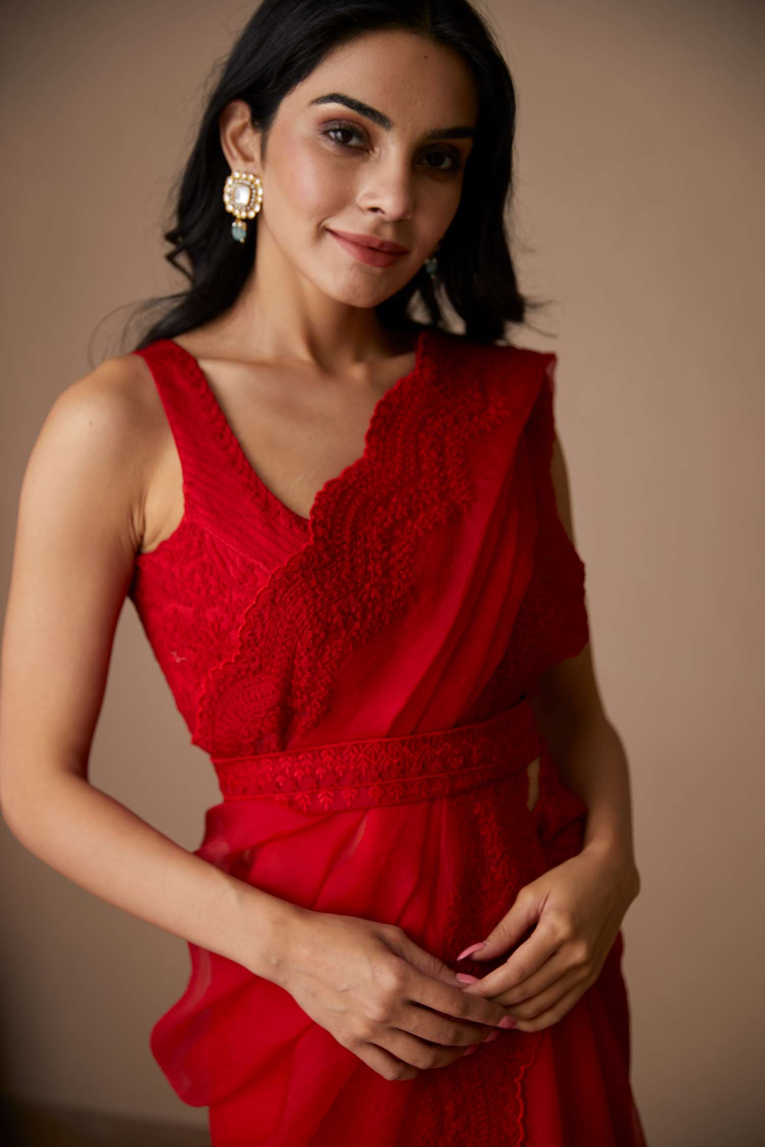 Close-up of Red Thread Work Organza Saree Set