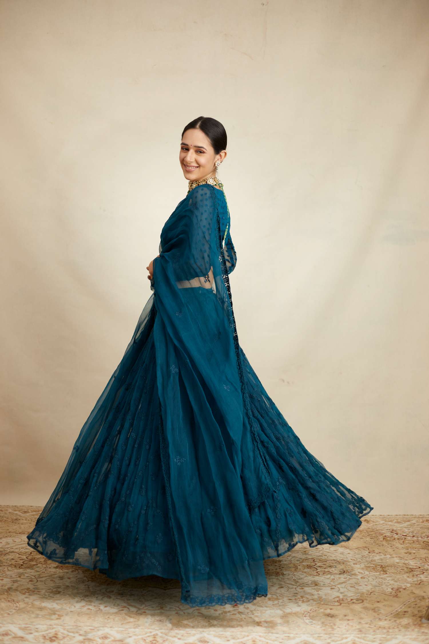 Side view of Teal Blue Thread Work Lehenga Set
