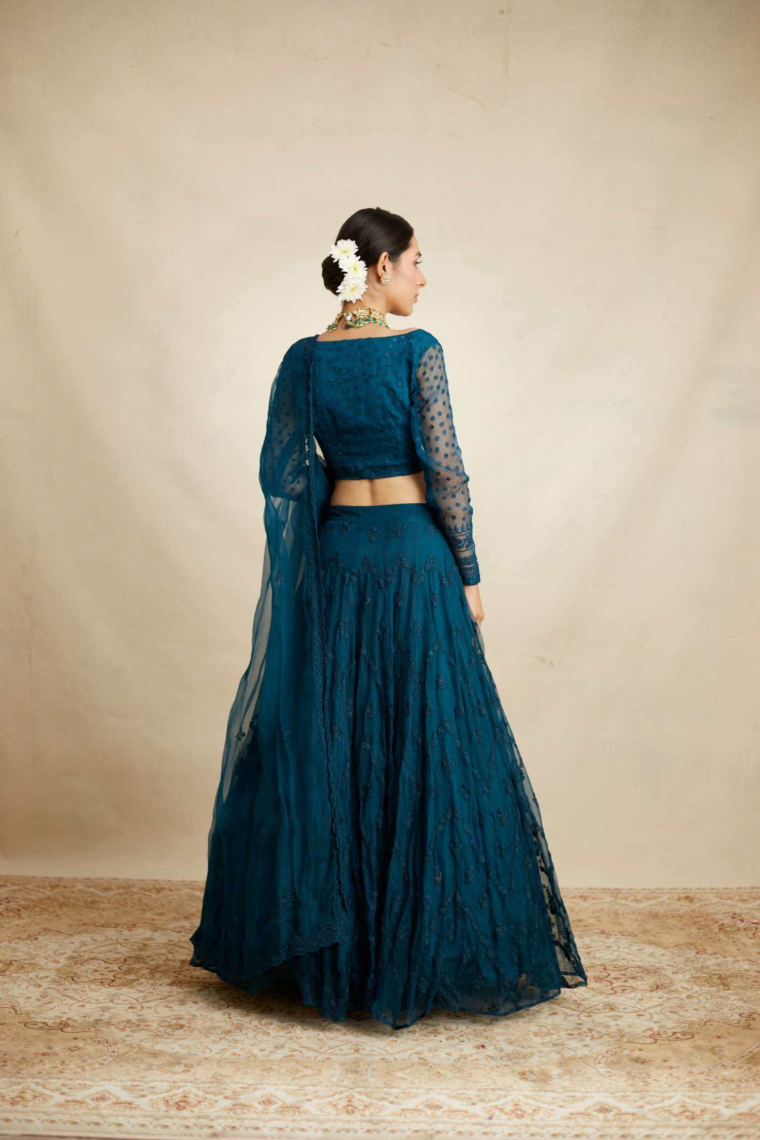 Back angle view of Teal Blue Thread Work Lehenga Set