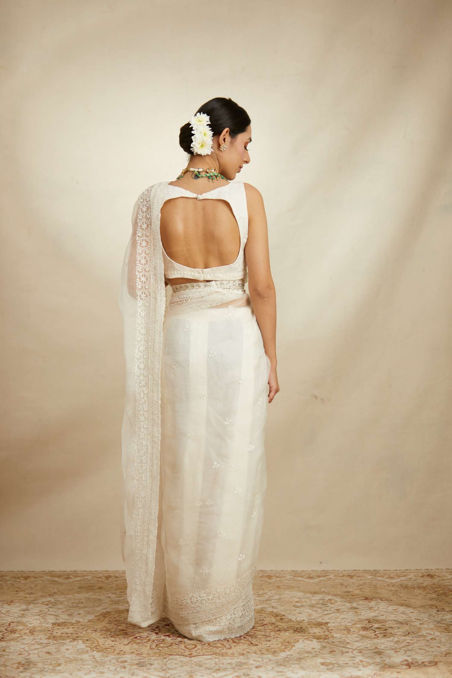 Back view of White Thread Work Saree Set