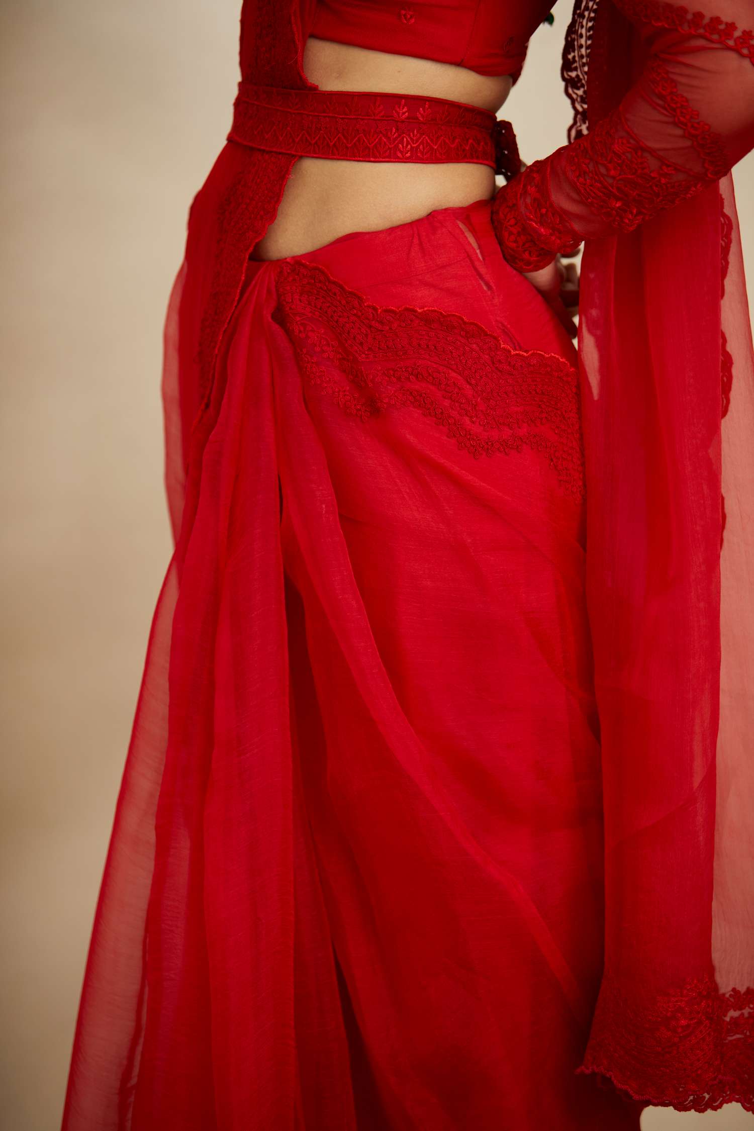 Close-up of Red Thread Work Saree Set