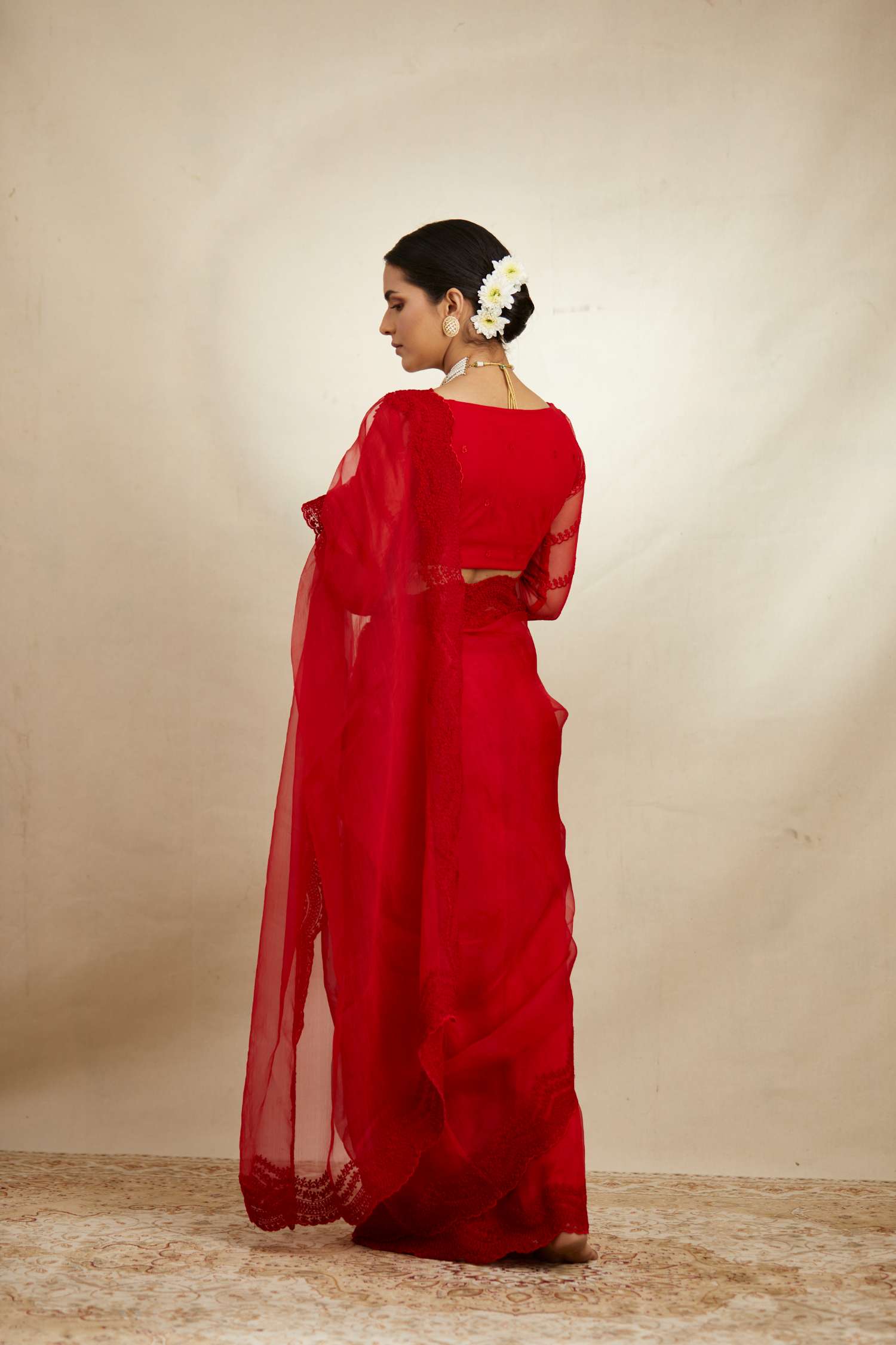 Back angle view of Red Thread Work Saree Set