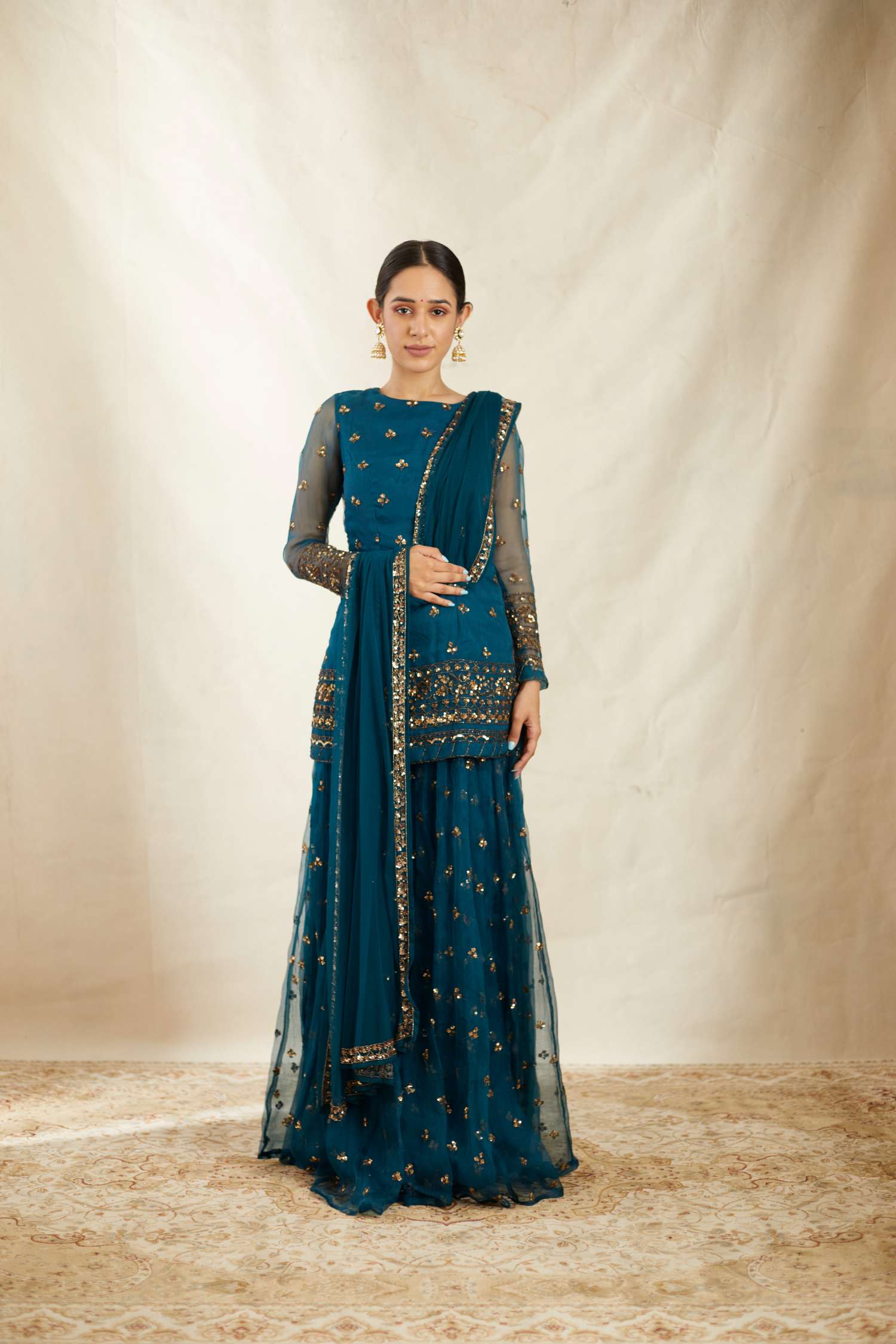 Front view of Teal Blue Organza Sequence Work Kurti Sharara Set
