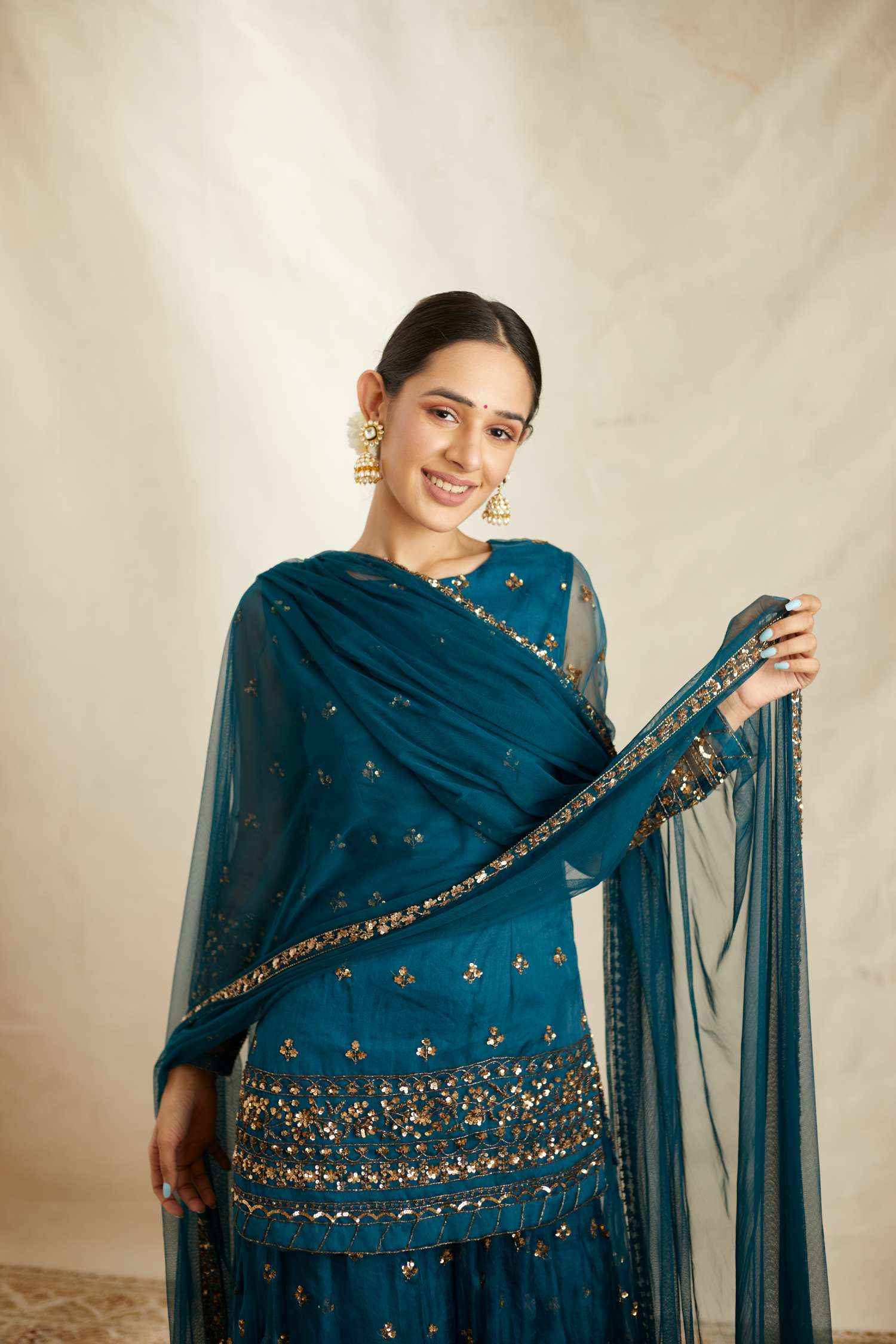 Front view of Teal Blue Organza Sequence Work Kurti Sharara Set