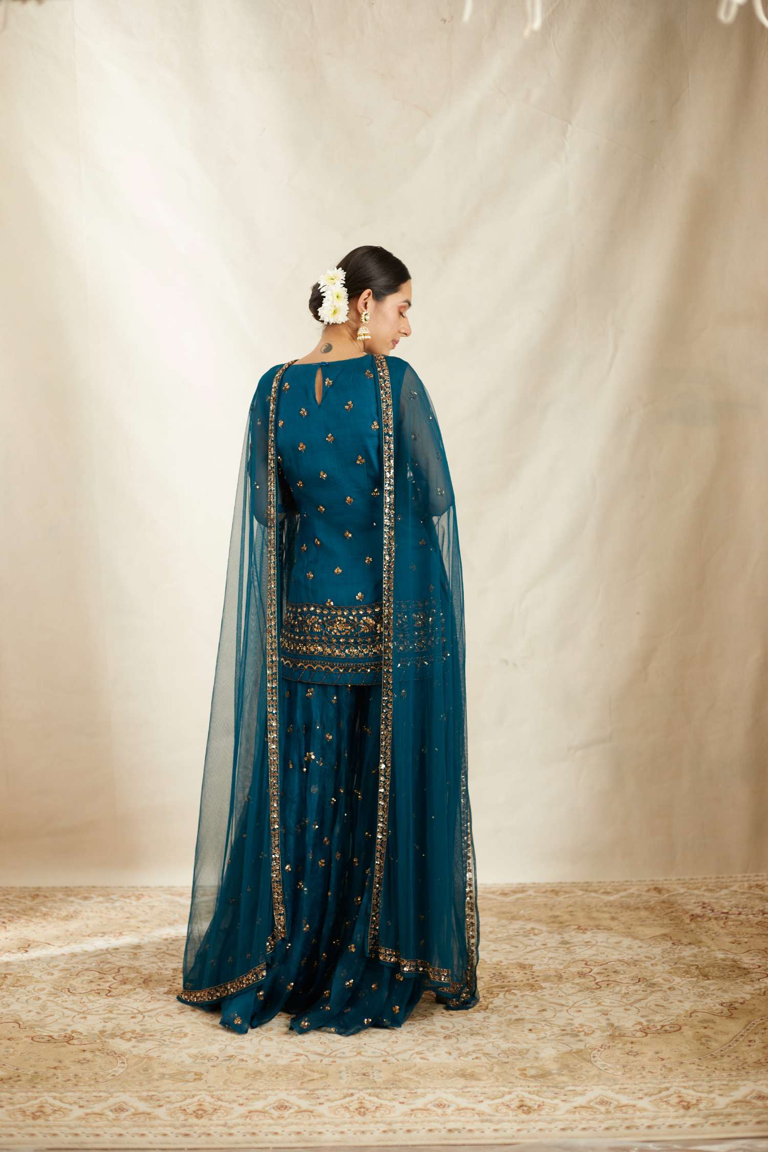 Back Angle view of Teal Blue Organza Sequence Work Kurti Sharara Set