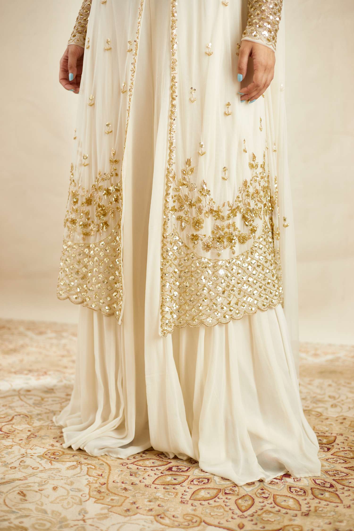 Close-up View of Off White Net Front Open Jacket With Sharara Set