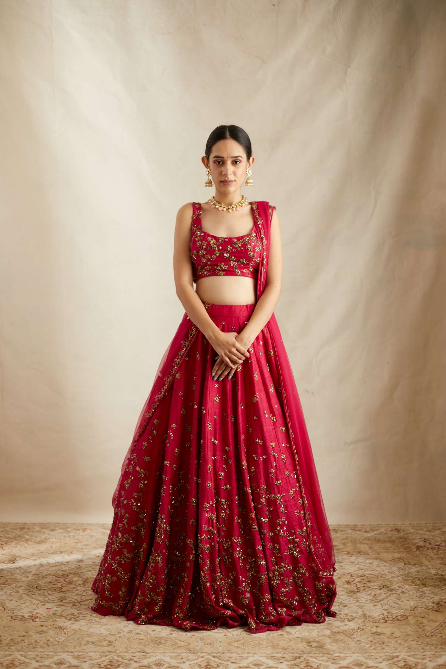 Front view of Caramine Pink Embellished Lehenga Set