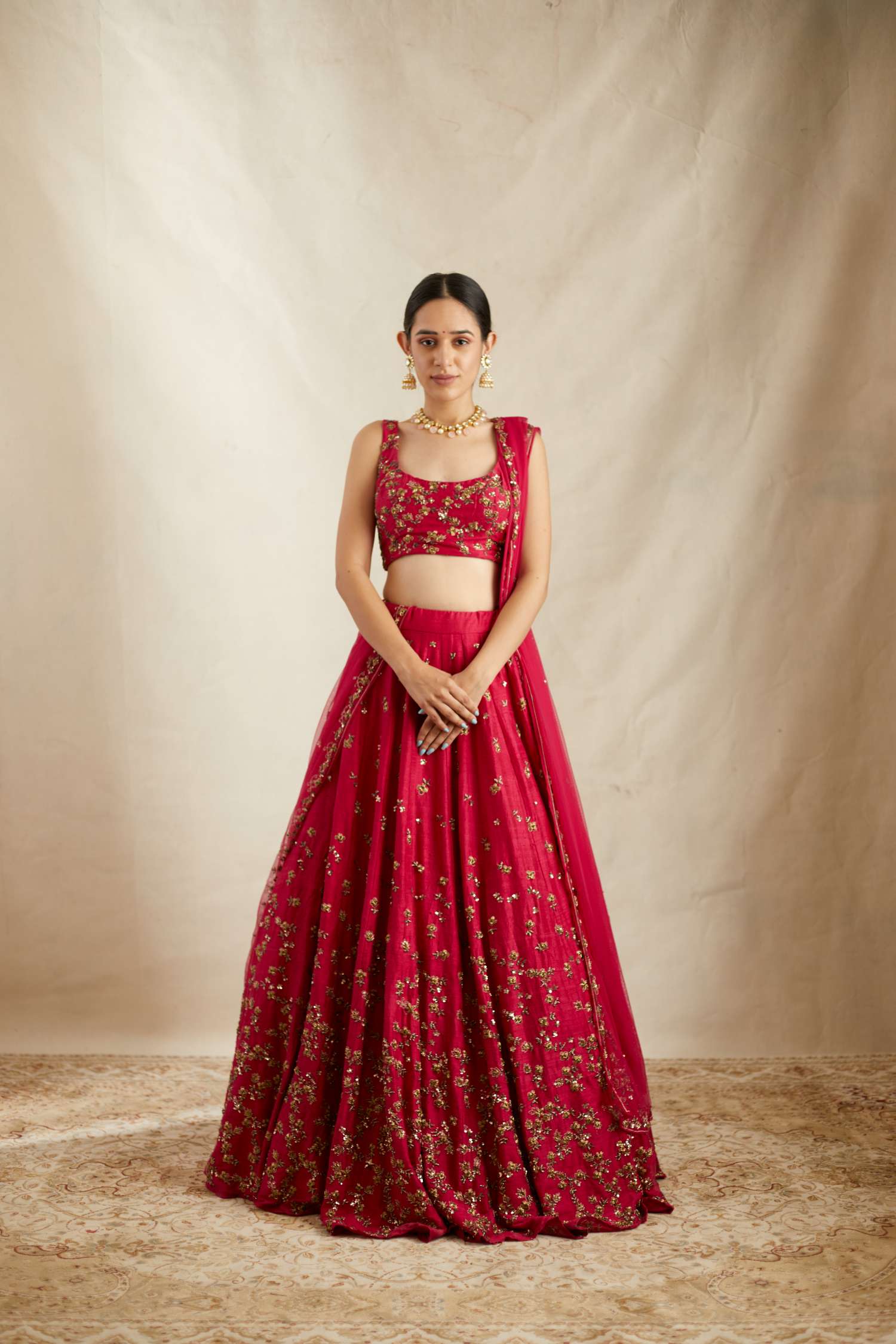 Front view of Caramine Pink Embellished Lehenga Set