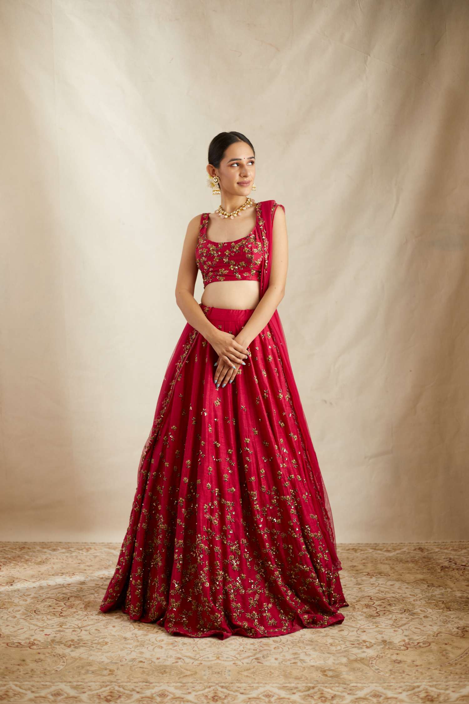 Side view of Caramine Pink Embellished Lehenga Set