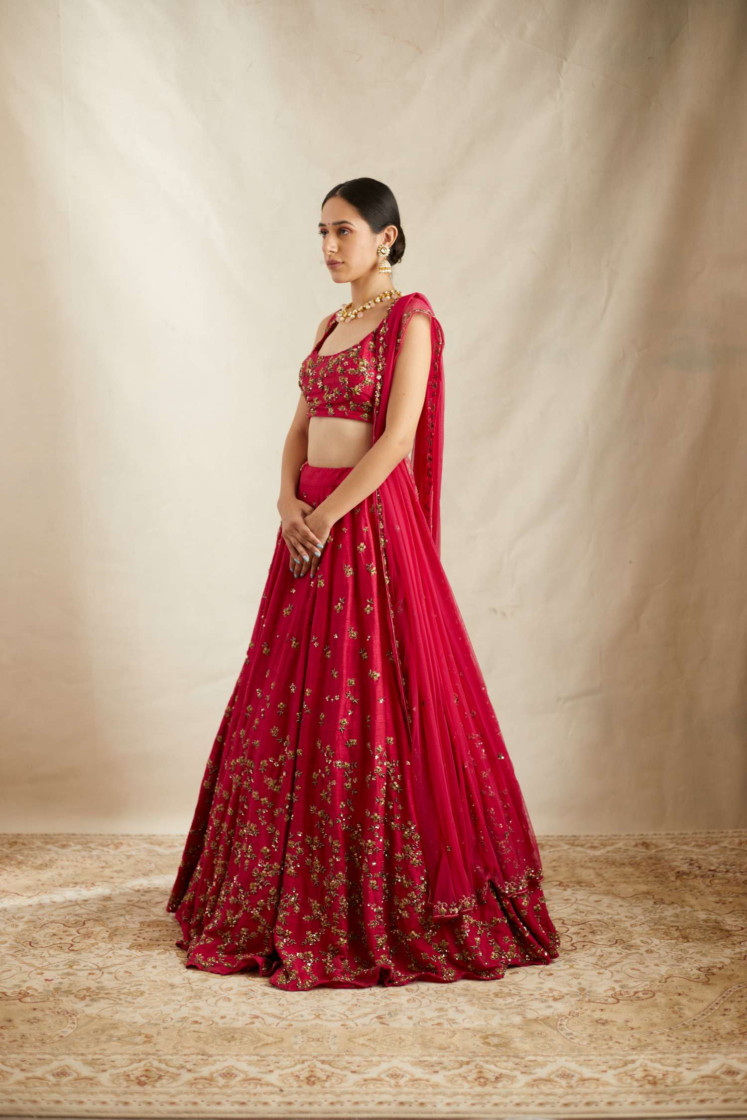 Side back view of Caramine Pink Embellished Lehenga Set